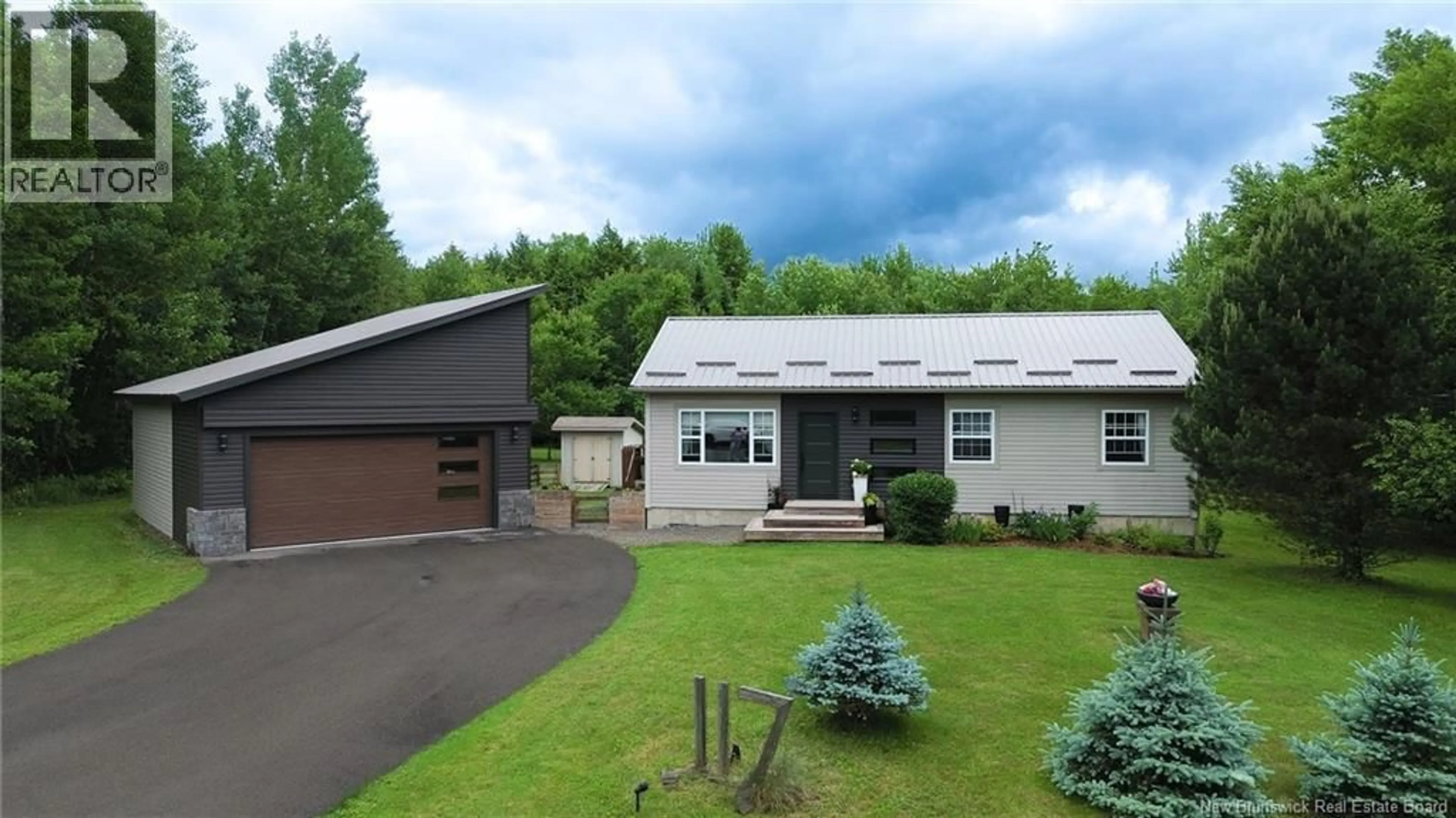 Home with vinyl exterior material, street for 117 ROLLING HILL DRIVE, Richibucto Road New Brunswick E3A9V1