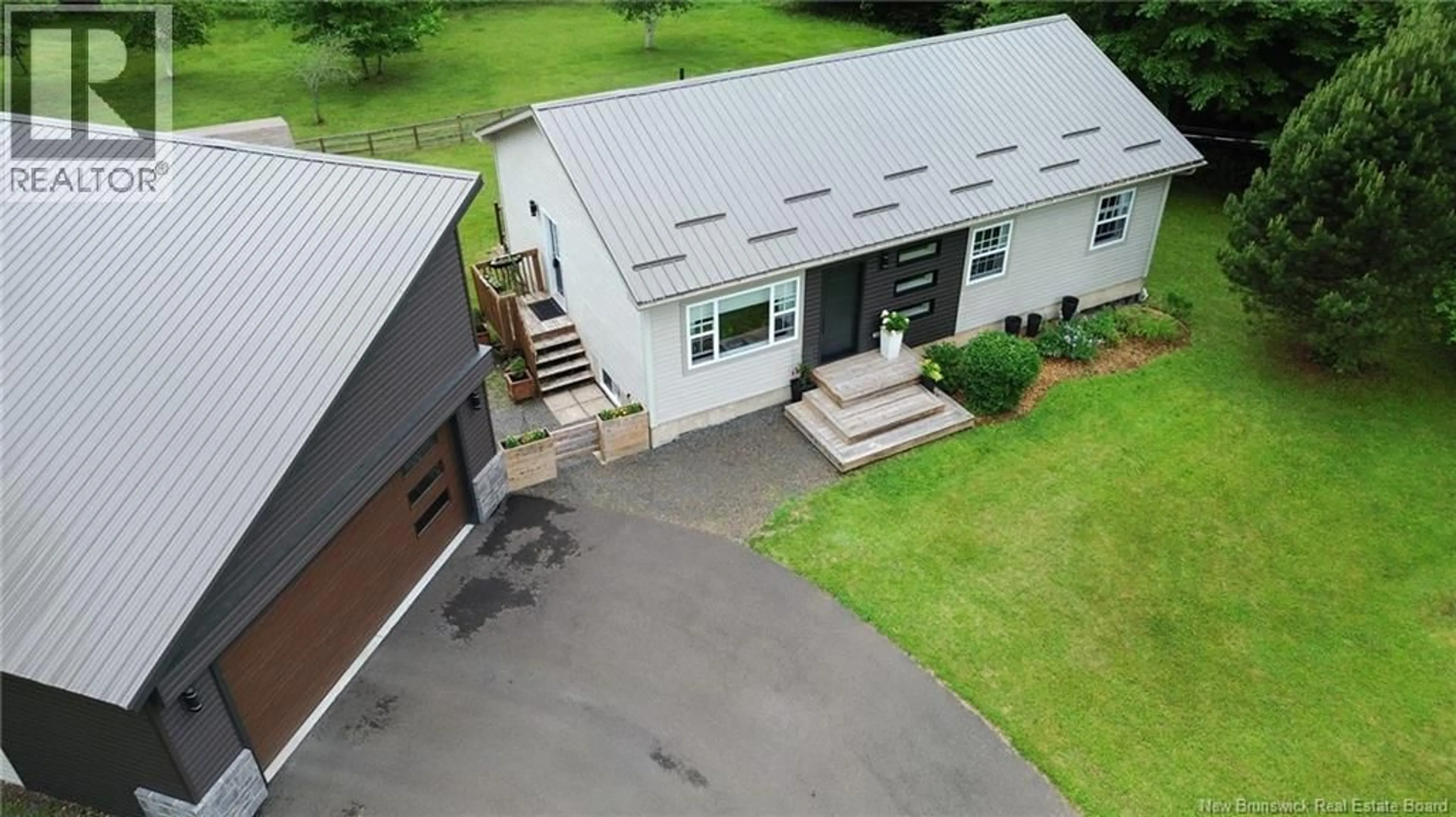 A pic from outside/outdoor area/front of a property/back of a property/a pic from drone, unknown for 117 ROLLING HILL DRIVE, Richibucto Road New Brunswick E3A9V1