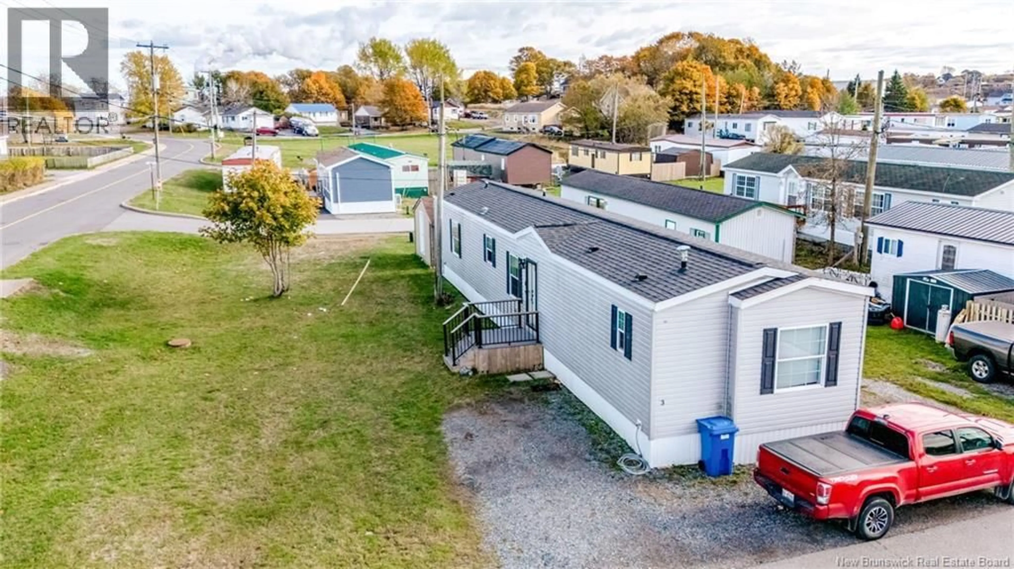 A pic from outside/outdoor area/front of a property/back of a property/a pic from drone, unknown for 3 DAISY STREET, Saint John New Brunswick E2M5M9
