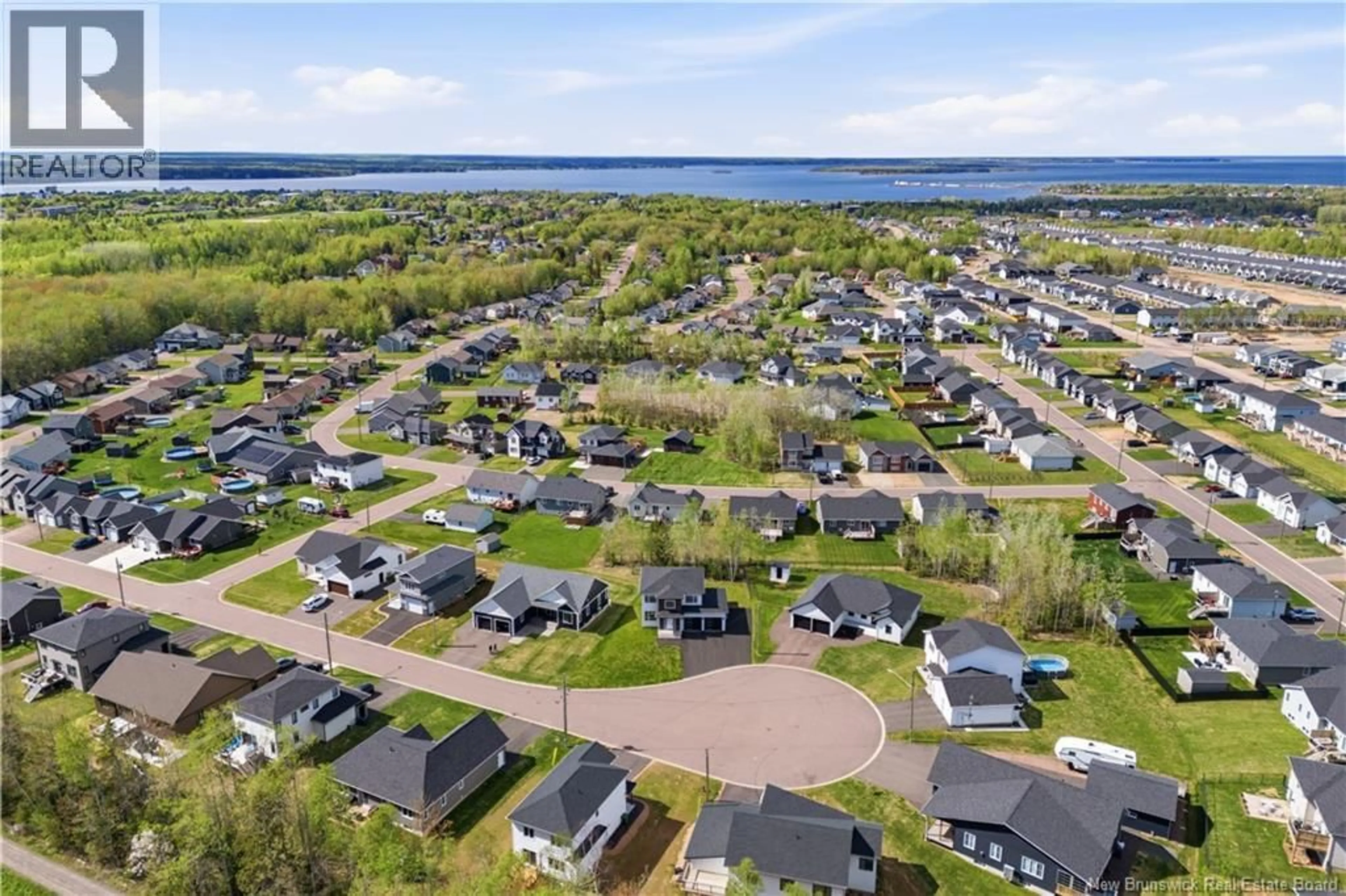 A pic from outside/outdoor area/front of a property/back of a property/a pic from drone, water/lake/river/ocean view for 72 GUY STREET, Shediac New Brunswick E4P0L5