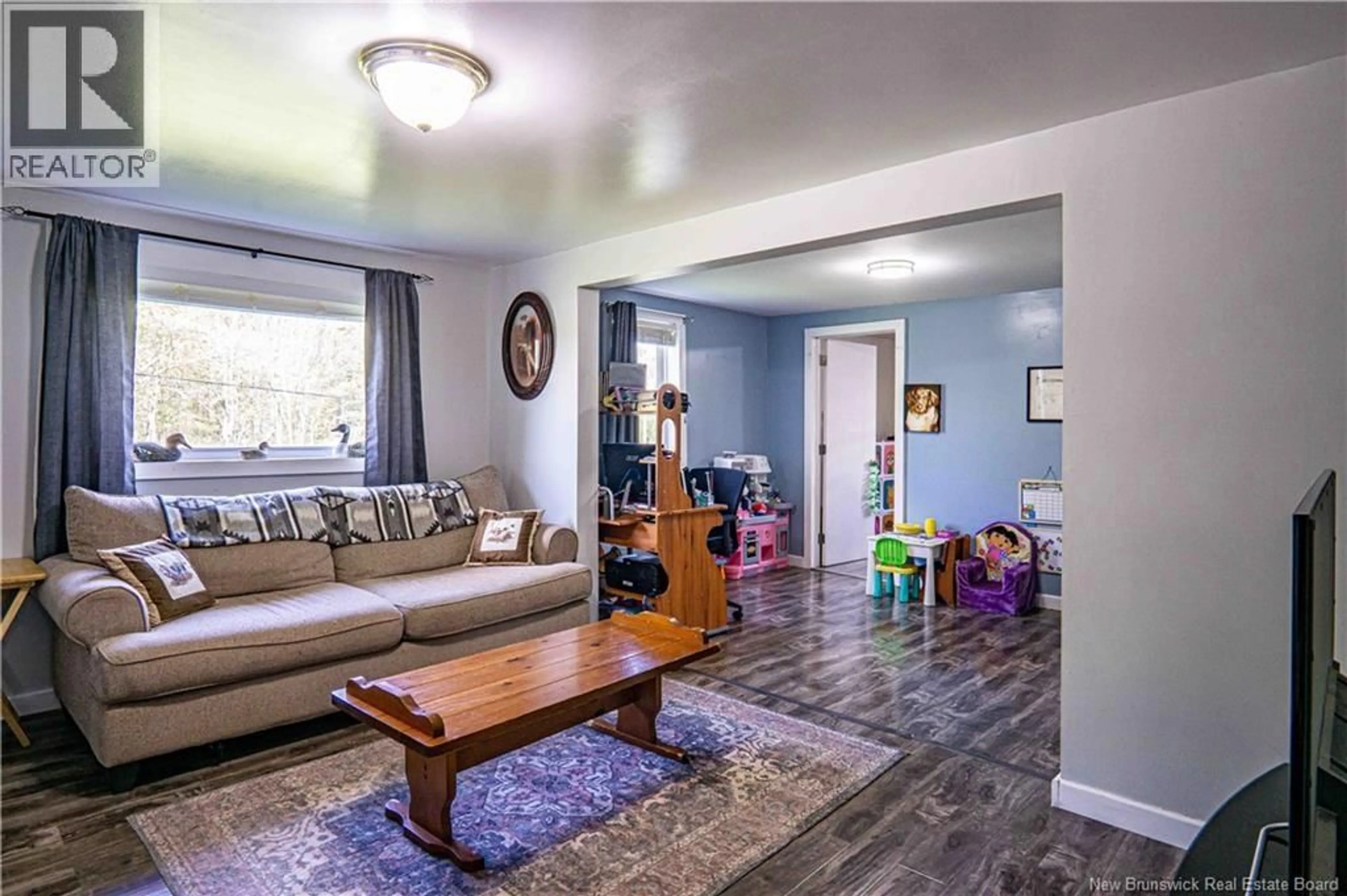 Living room with furniture, wood/laminate floor for 190 UPPER HAMPSTEAD ROAD, Gagetown New Brunswick E5M1W1
