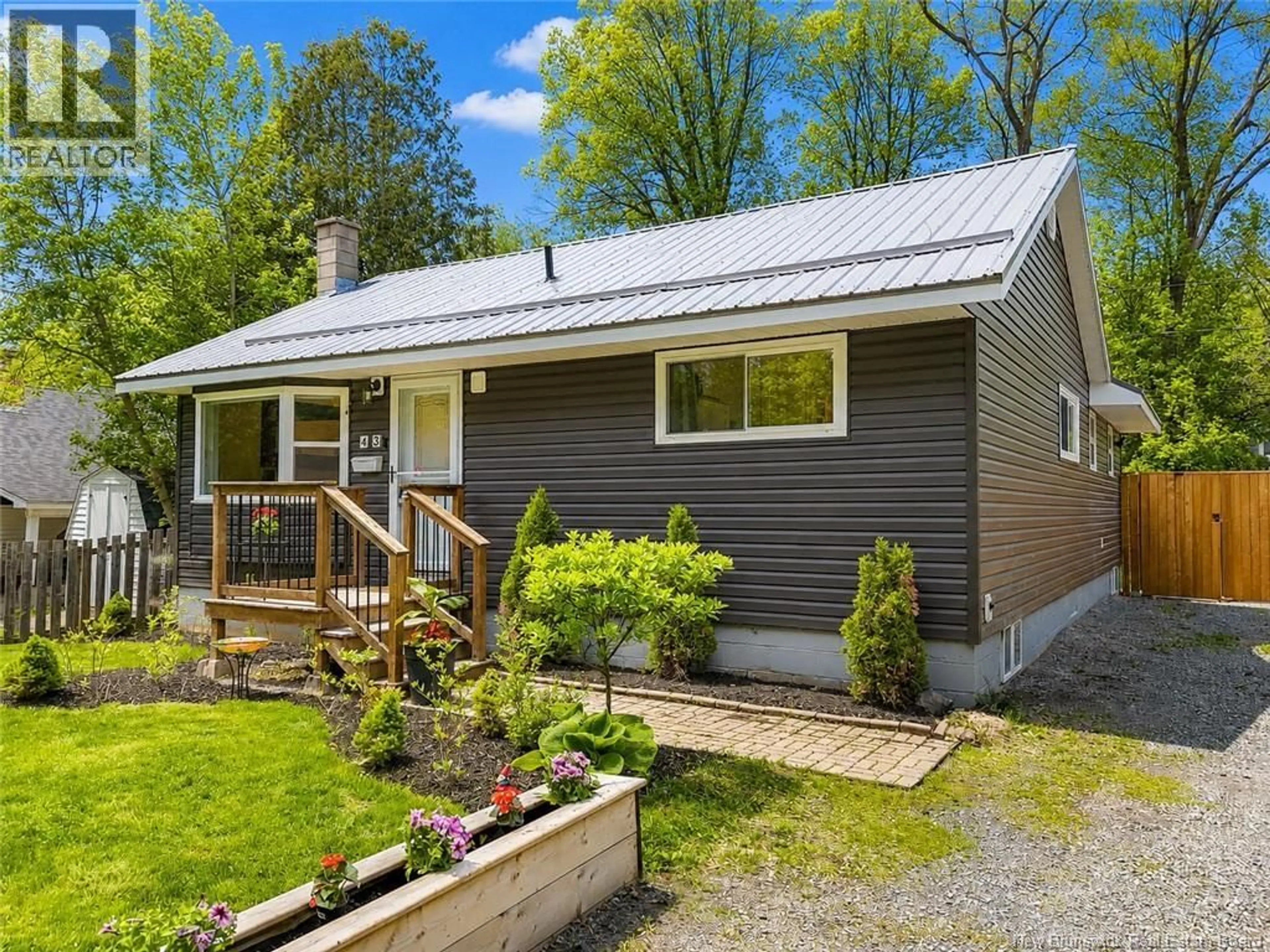 Home with vinyl exterior material, street for 43 HACHEY AVENUE, Fredericton New Brunswick E3A3X7