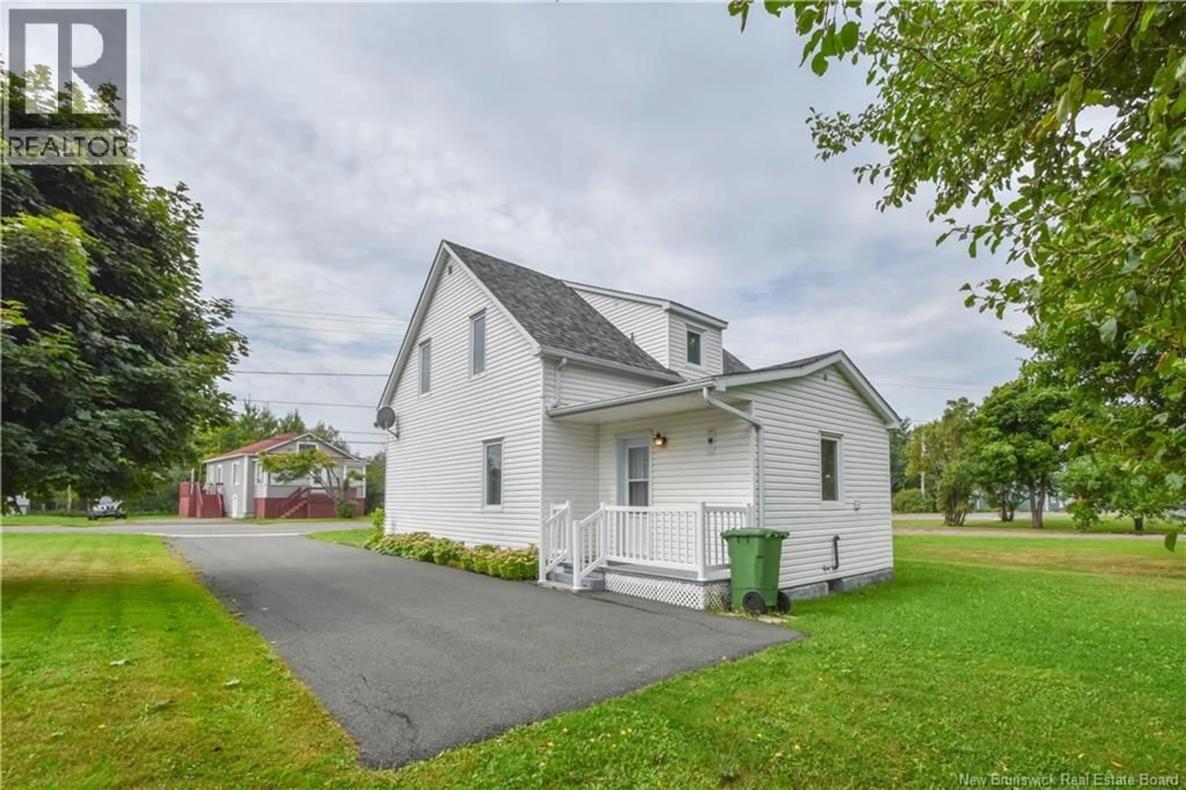 Home with vinyl exterior material, street for 310 JD GAUTHIER BOULEVARD, Shippagan New Brunswick E8S1R4
