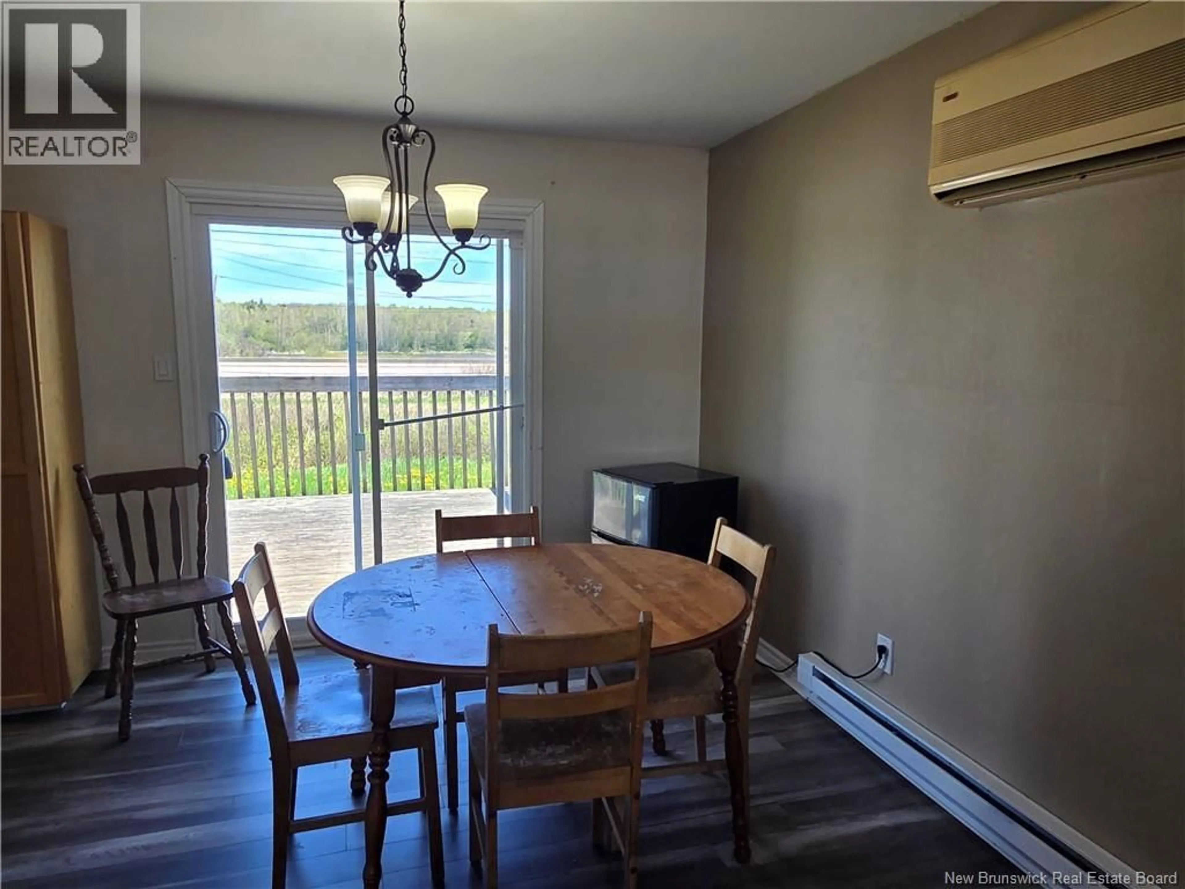 Dining room, wood/laminate floor for 19 ANNE STREET, Moncton New Brunswick E1C4J4