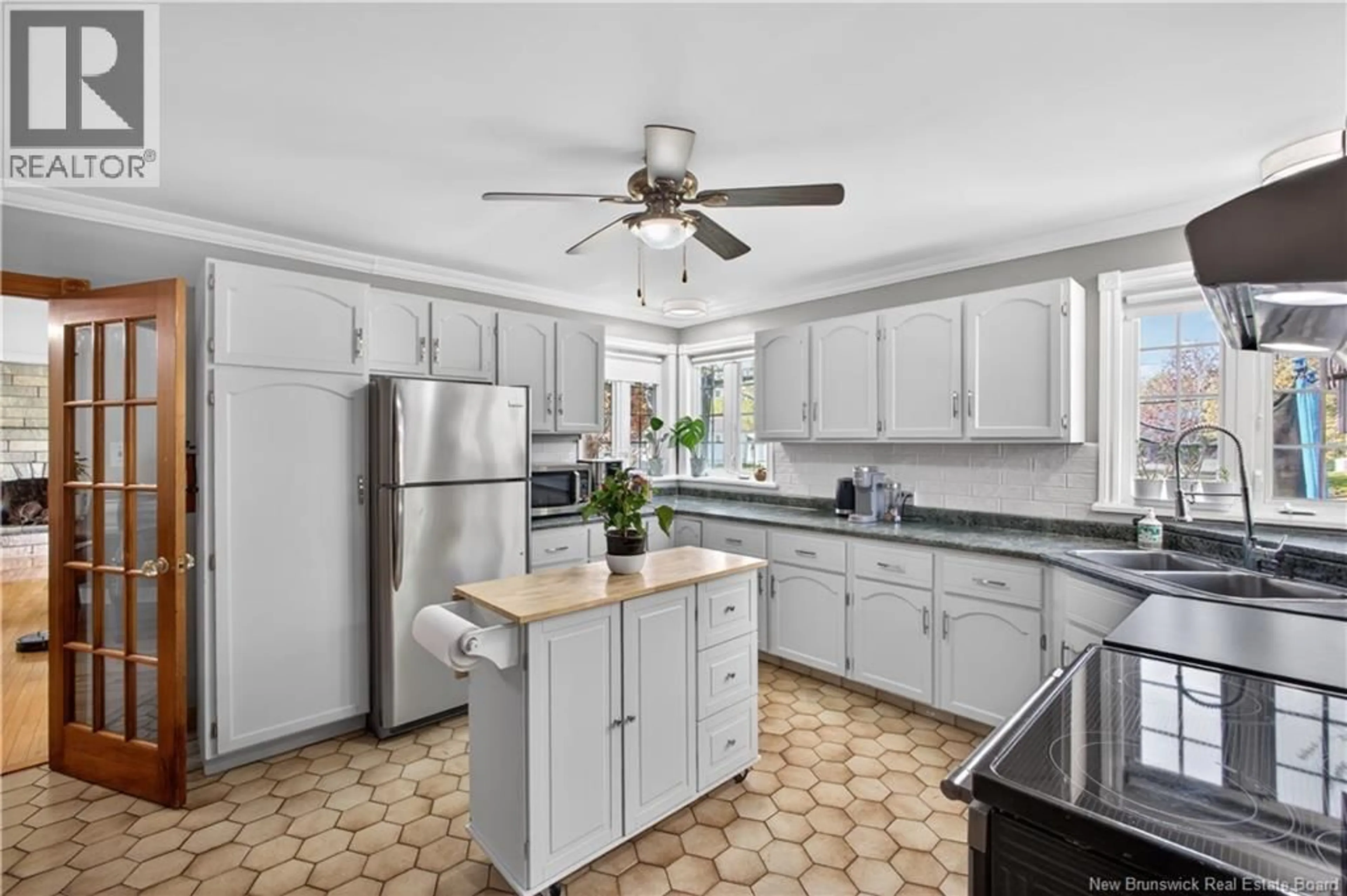 Open concept kitchen, ceramic/tile floor for 49 MCINTOSH STREET, Miramichi New Brunswick E1N2B3