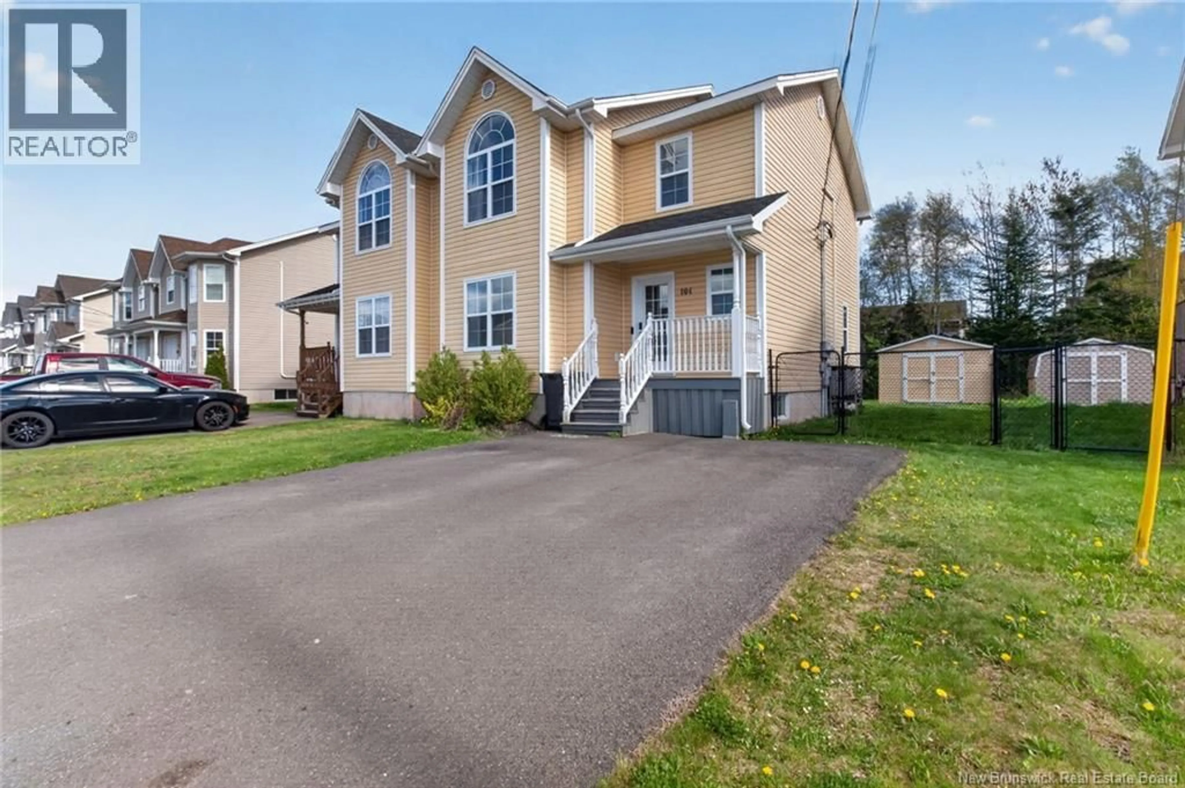 Home with vinyl exterior material, street for 104 CHIANTI STREET, Dieppe New Brunswick E1A8V8