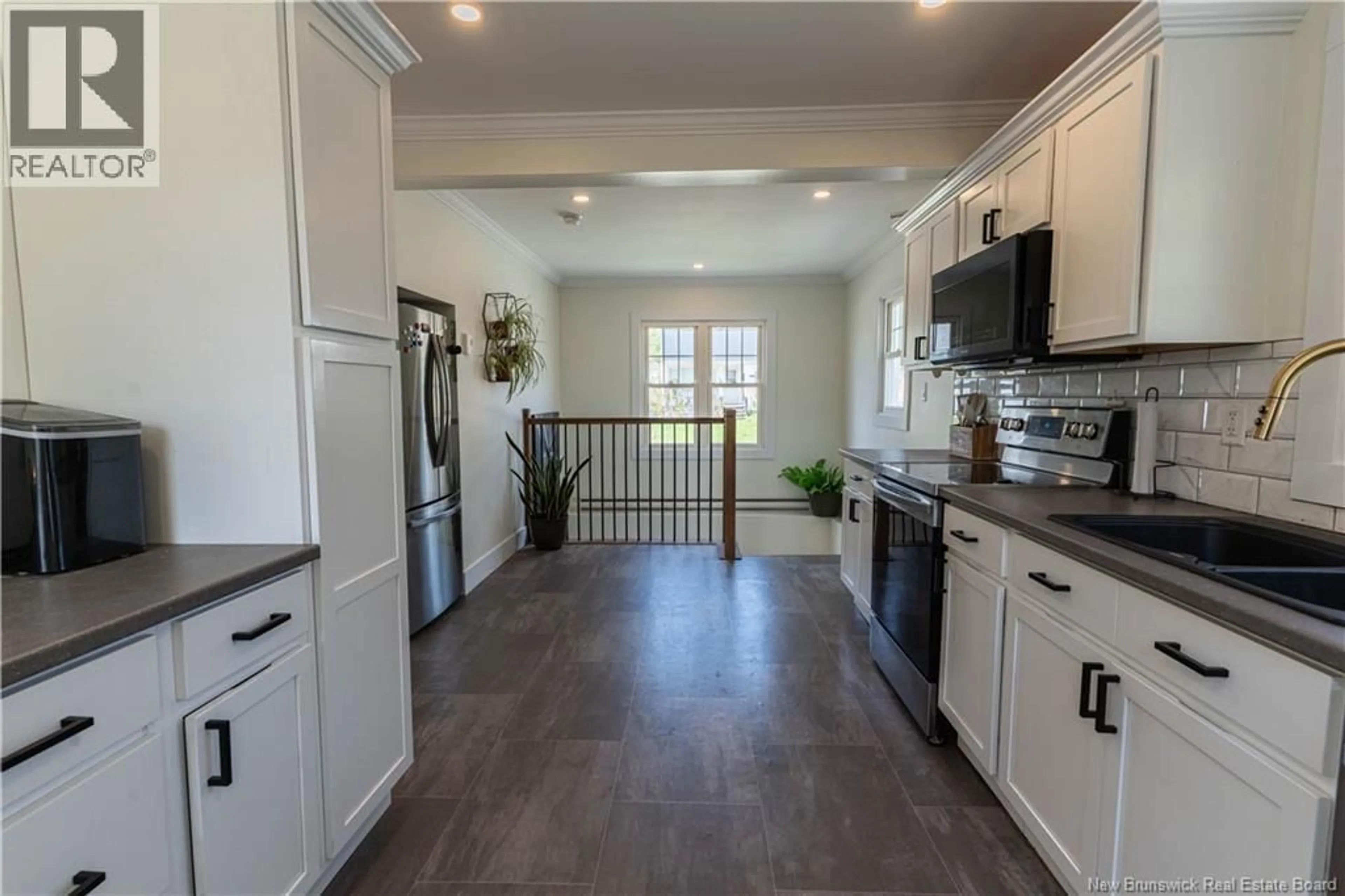 Open concept kitchen, ceramic/tile floor for 146 BURNS ST, Miramichi New Brunswick E1V1H9