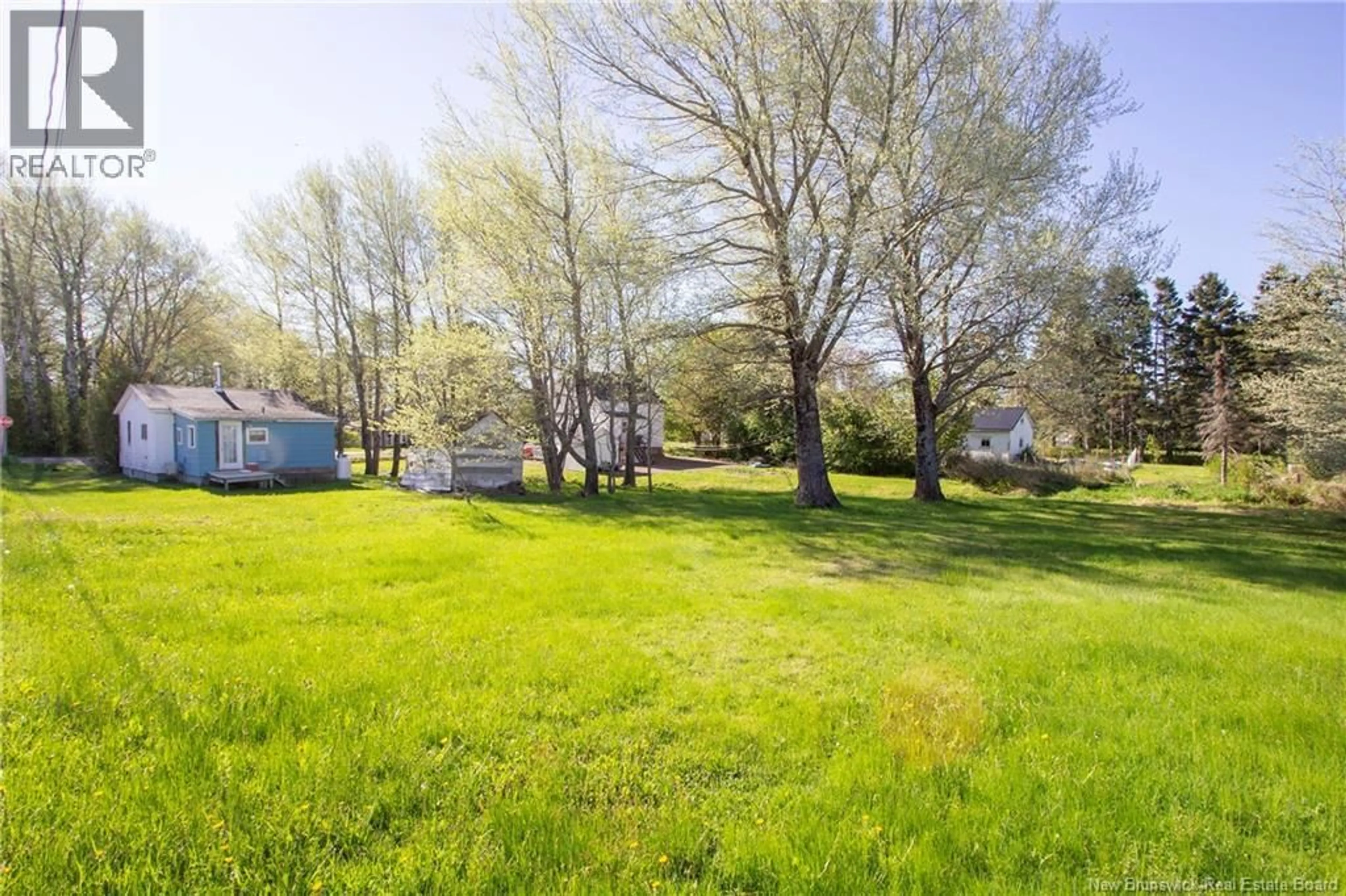A pic from outside/outdoor area/front of a property/back of a property/a pic from drone, forest/trees view for 27 RICHARDSON STREET, Sackville New Brunswick E4L4H7