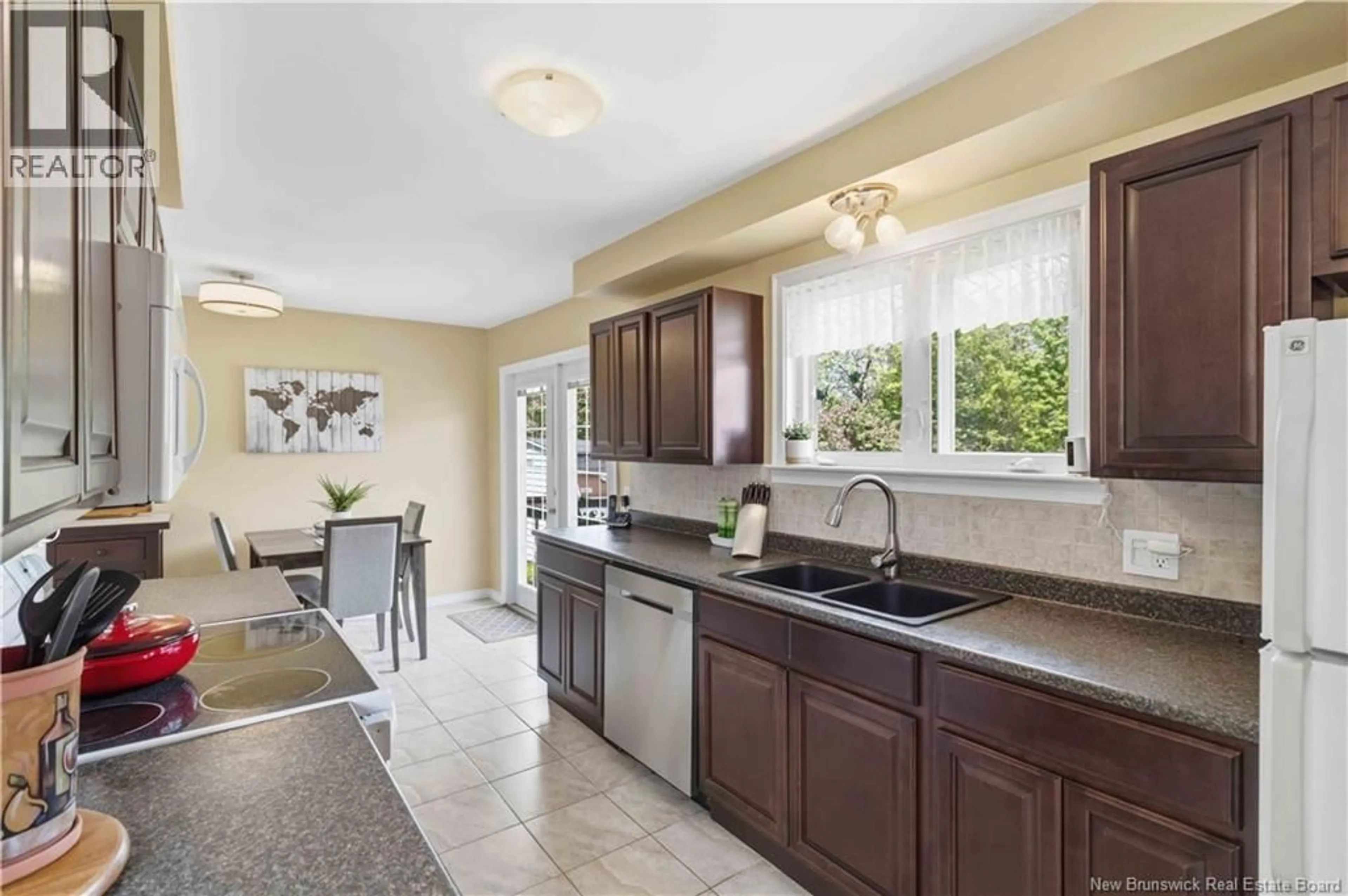 Open concept kitchen, ceramic/tile floor for 204 MACFARLANE STREET, Fredericton New Brunswick E3A1V6