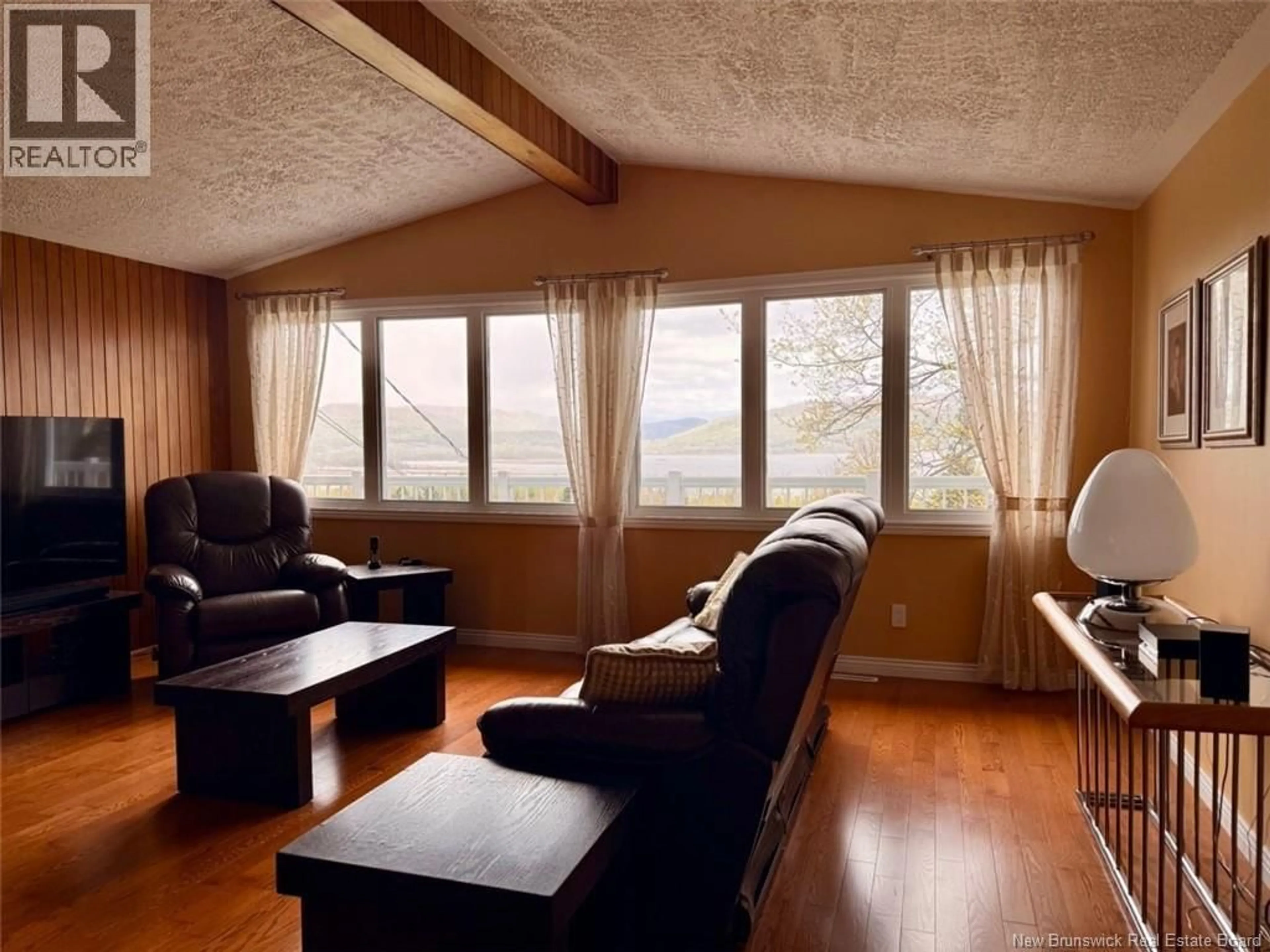 Living room with furniture, wood/laminate floor for 31 MACBEATH COURT, Tide Head New Brunswick E3N4G5
