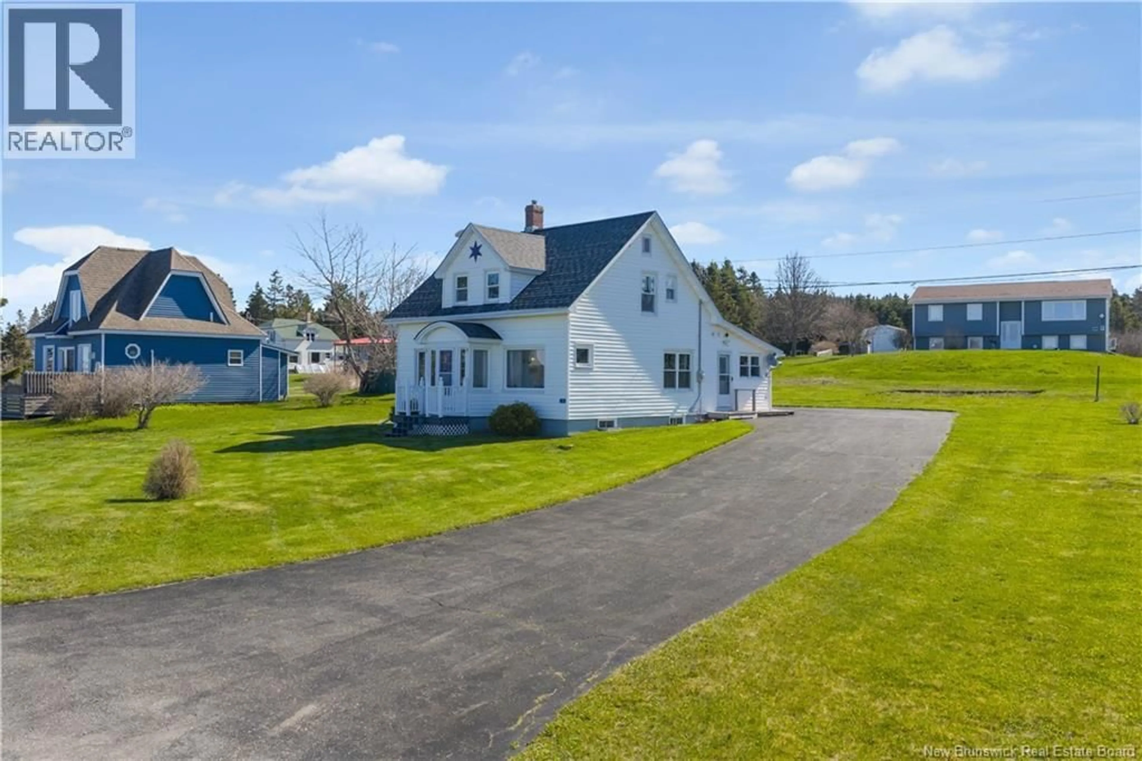 A pic from outside/outdoor area/front of a property/back of a property/a pic from drone, street for 243 MACES BAY ROAD, Maces Bay New Brunswick E5J1S8