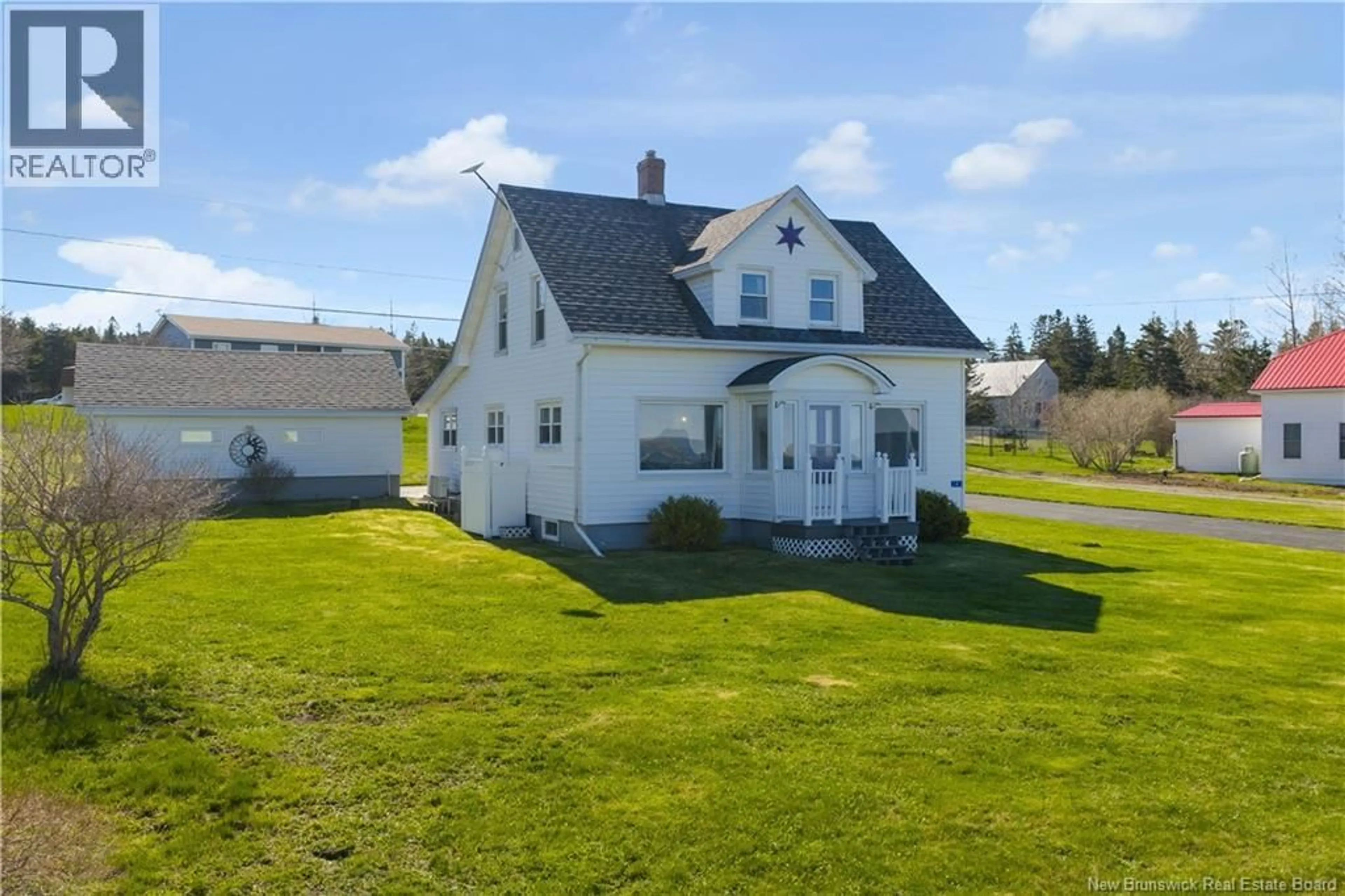 A pic from outside/outdoor area/front of a property/back of a property/a pic from drone, building for 243 MACES BAY ROAD, Maces Bay New Brunswick E5J1S8