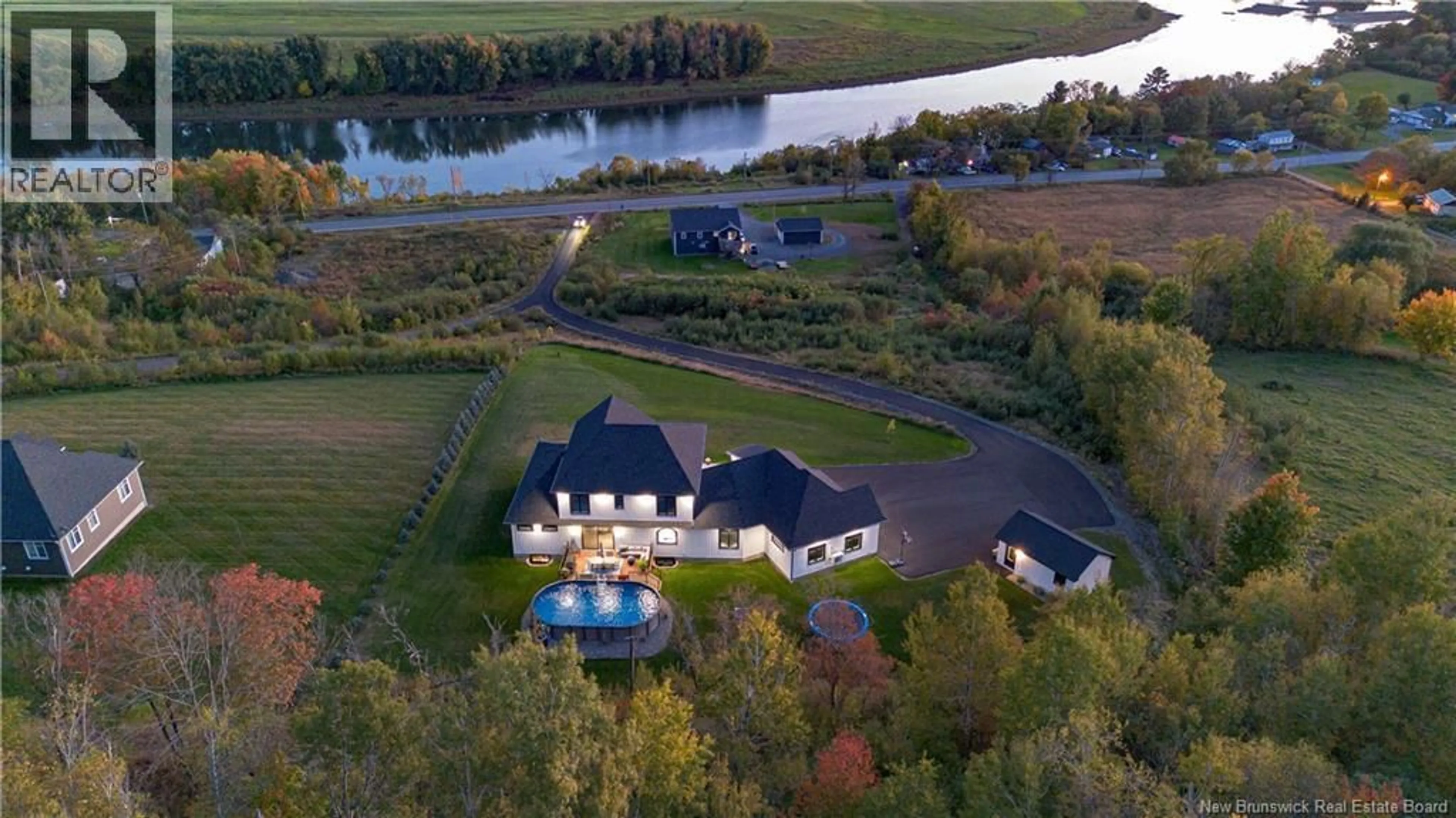 A pic from outside/outdoor area/front of a property/back of a property/a pic from drone, water/lake/river/ocean view for 1354 105 ROUTE ROUTE, Douglas New Brunswick E3G7K4