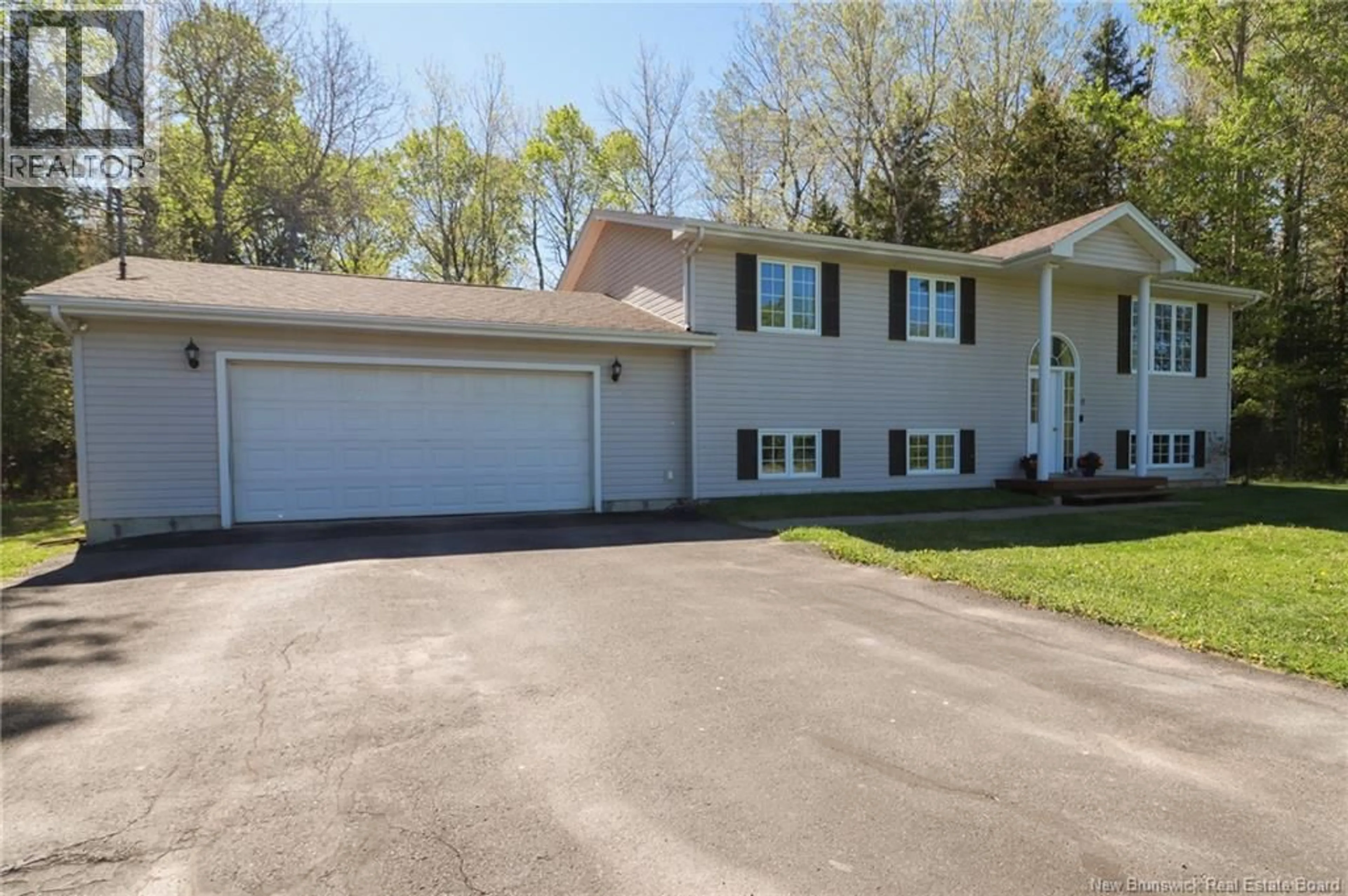 Home with vinyl exterior material, street for 6 NATHAN DRIVE, Passekeag New Brunswick E5N8A3