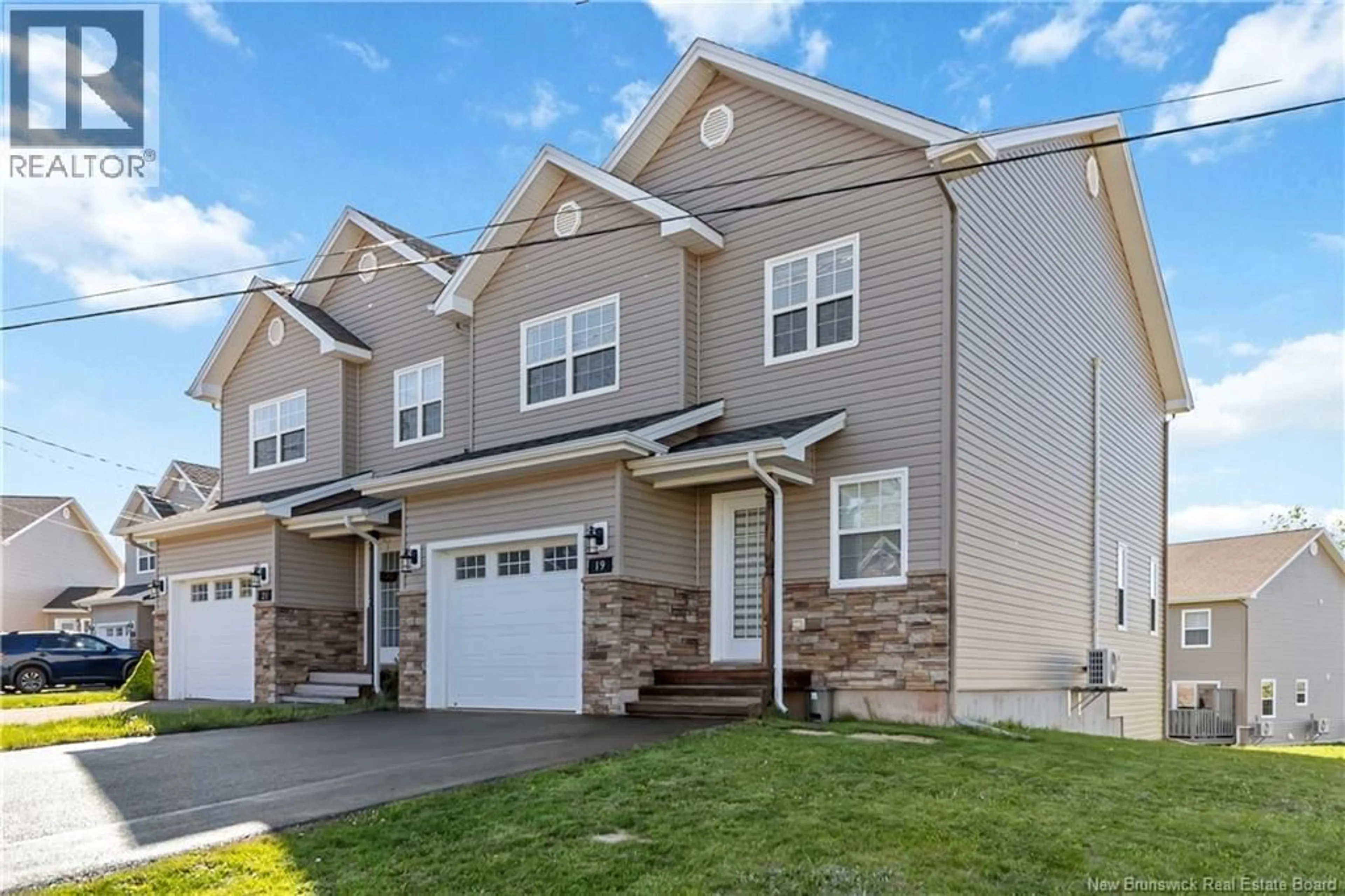 Home with vinyl exterior material, street for 19 POITOU COURT, Dieppe New Brunswick E1A9V1