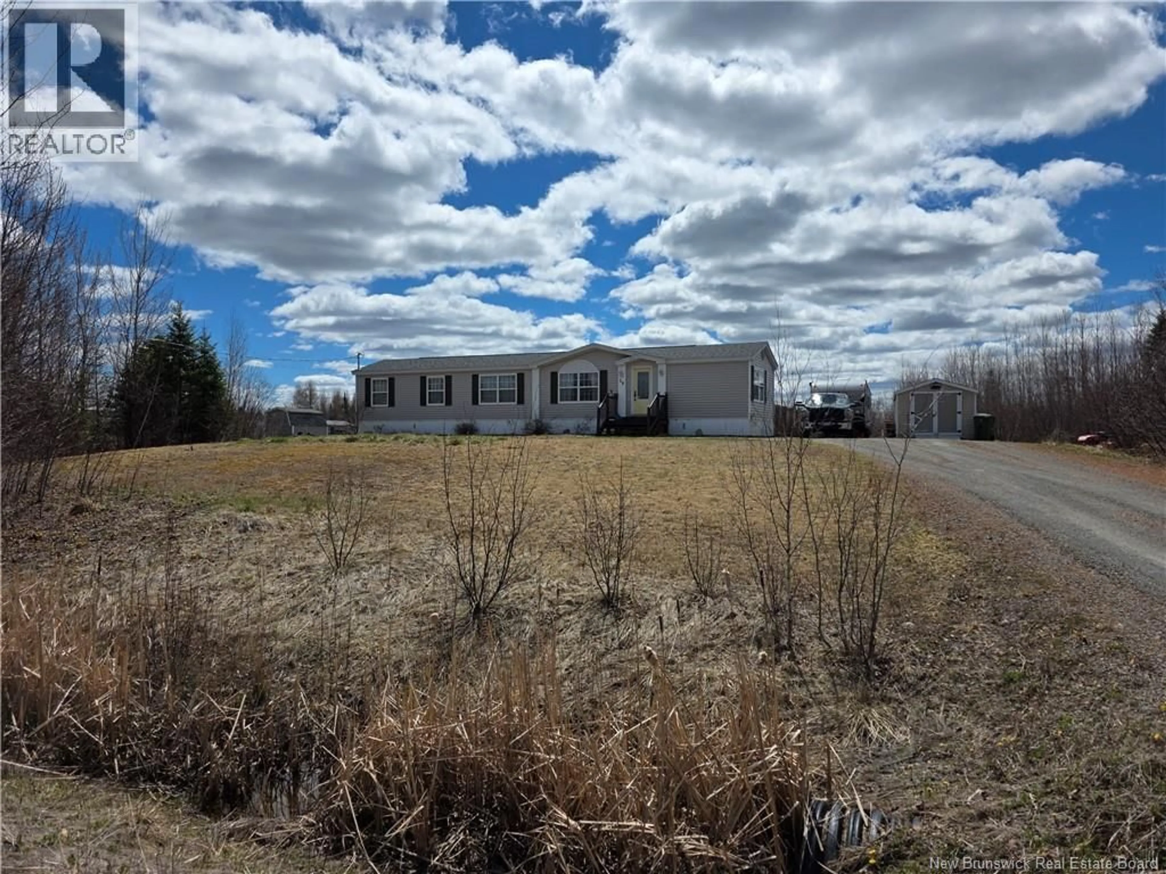 A pic from outside/outdoor area/front of a property/back of a property/a pic from drone, unknown for 20 CARRIE STREET, Rusagonis New Brunswick E3B0M3