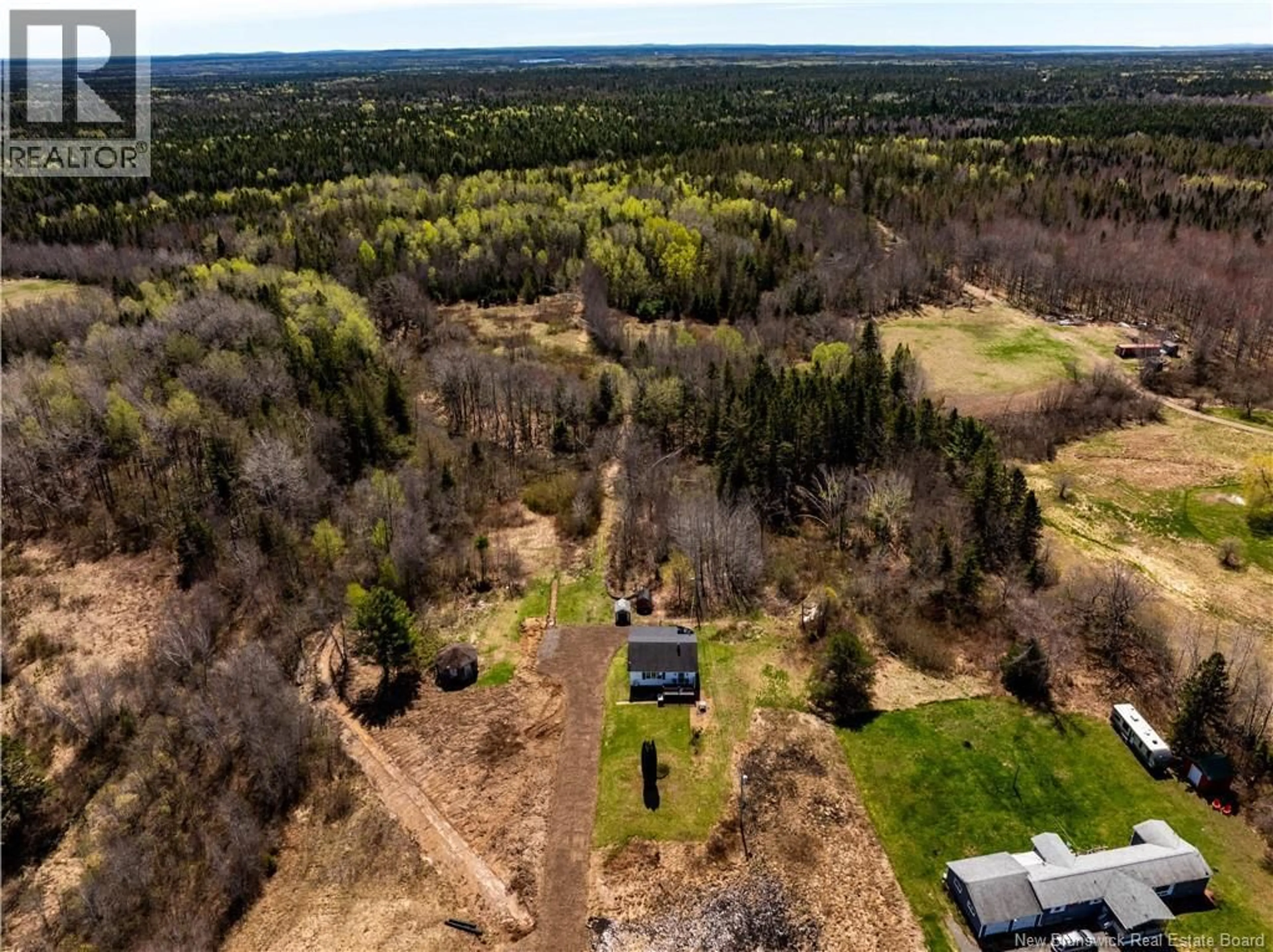 A pic from outside/outdoor area/front of a property/back of a property/a pic from drone, forest/trees view for 6386 ROUTE 10, Upper Salmon Creek New Brunswick E3A1E1