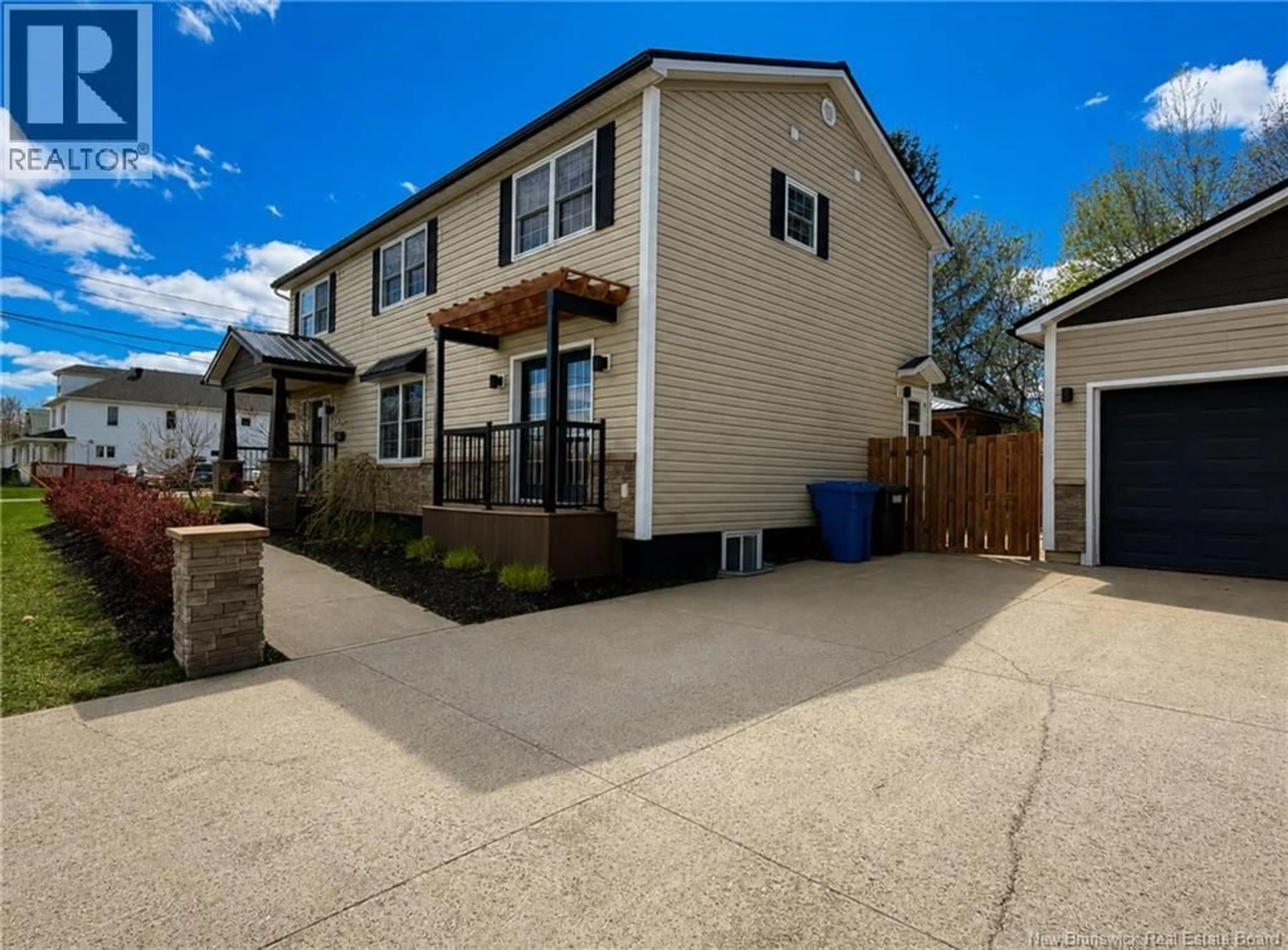 A pic from outside/outdoor area/front of a property/back of a property/a pic from drone, street for 319 RAYMOND AVENUE, Bathurst New Brunswick E2A2W3