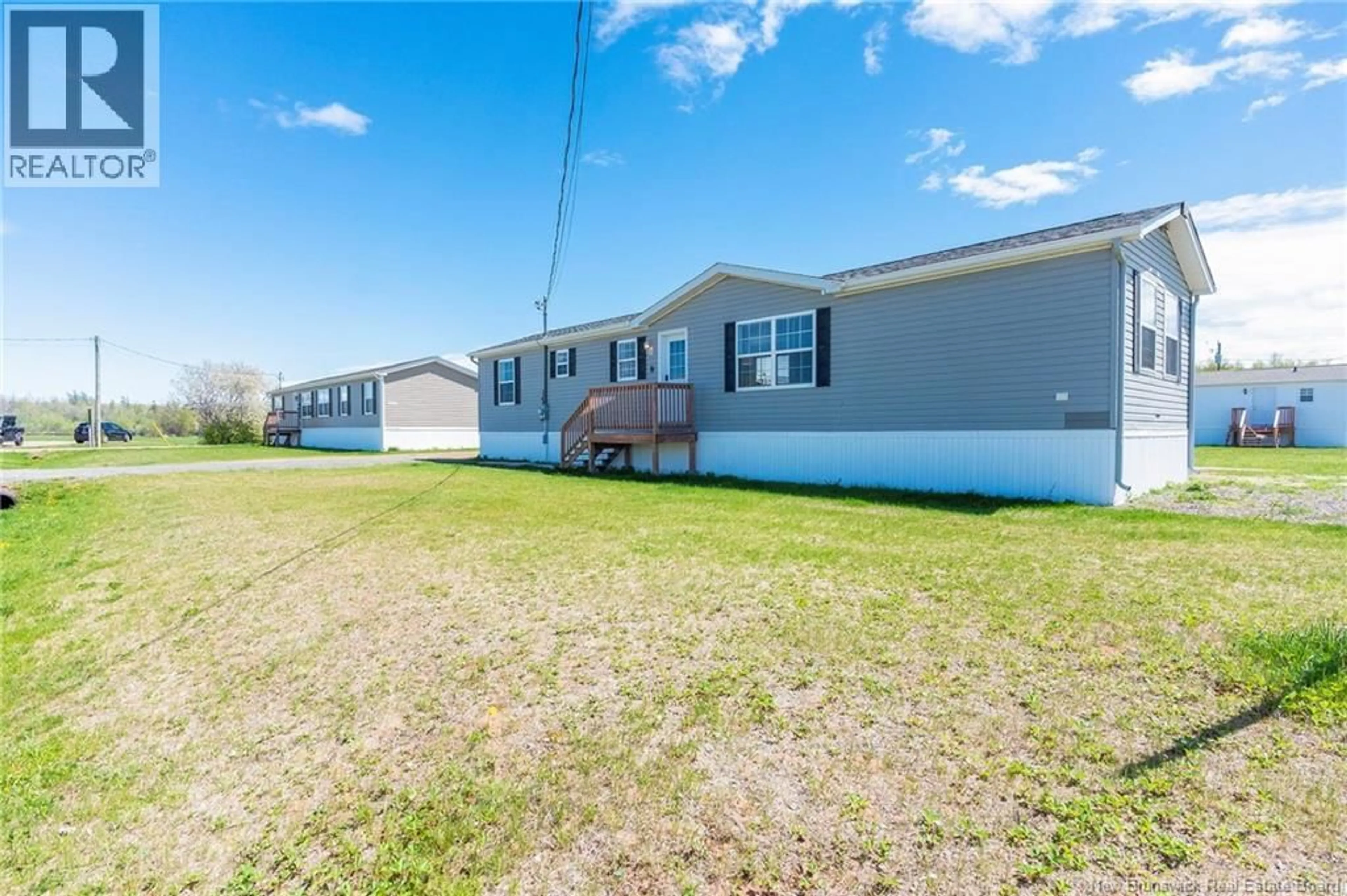 A pic from outside/outdoor area/front of a property/back of a property/a pic from drone, water/lake/river/ocean view for 8 FRANK STREET, Bas Cap Pele New Brunswick E4N0E6