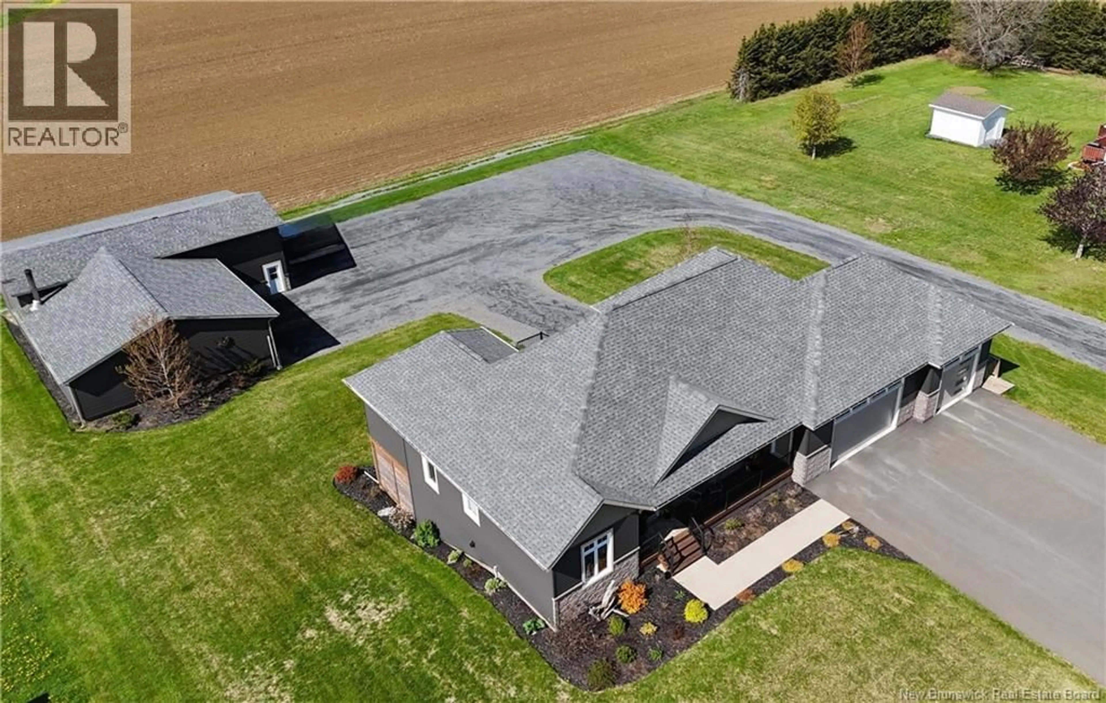 A pic from outside/outdoor area/front of a property/back of a property/a pic from drone, building for 1047 ROUTE 108, DSL de Drummond/DSL of Drummond New Brunswick E3Y2J6