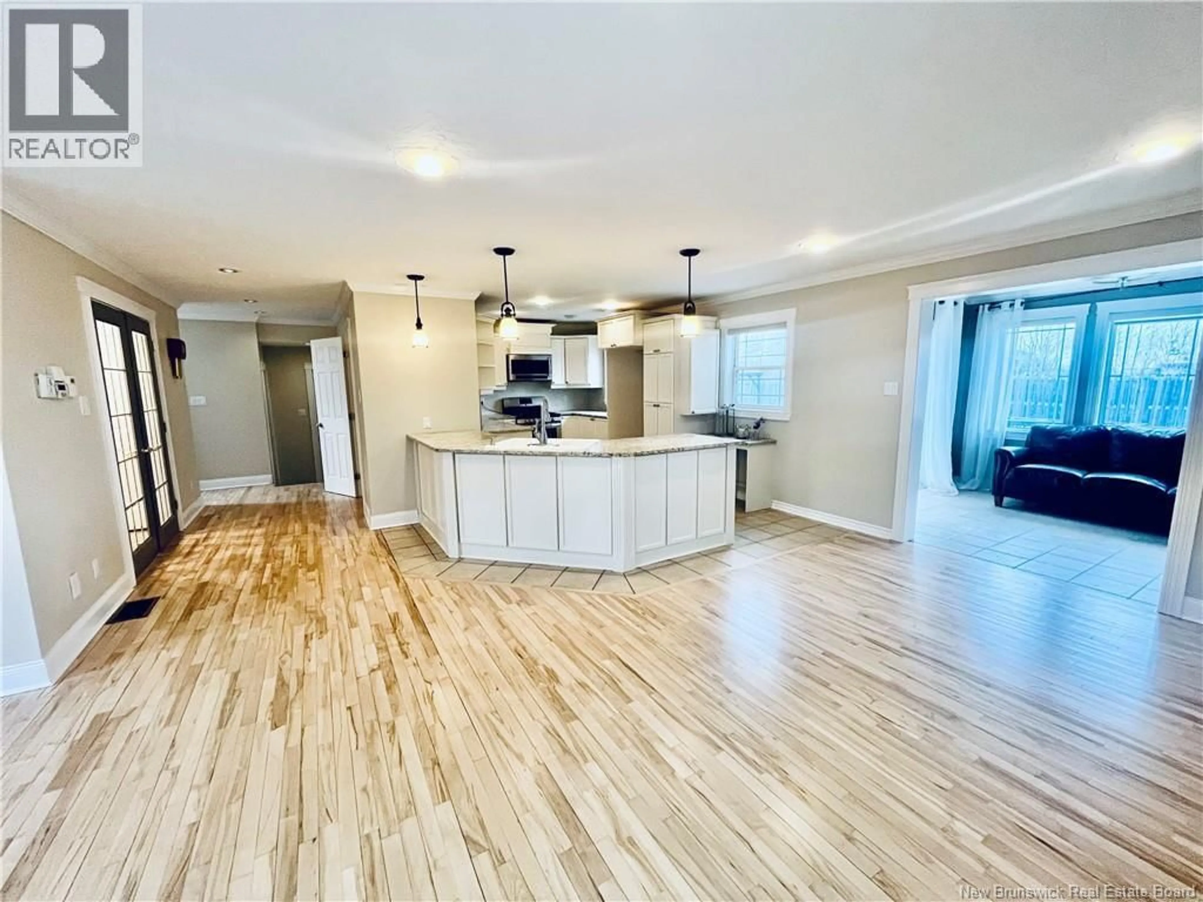 Open concept kitchen, wood/laminate floor for 72 BLISS CARMAN DRIVE, Fredericton New Brunswick E3B9P4