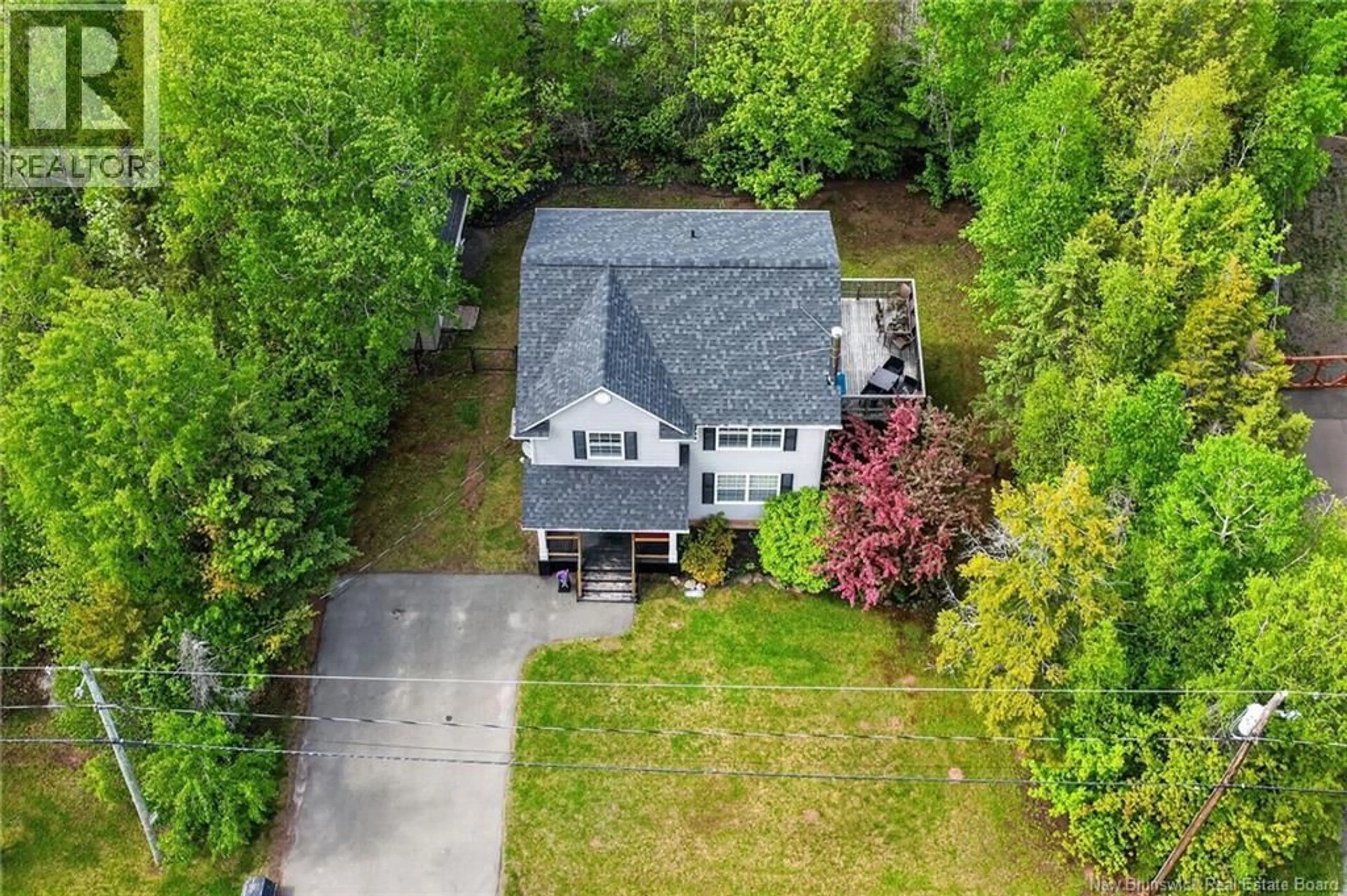 A pic from outside/outdoor area/front of a property/back of a property/a pic from drone, street for 1 MARCOMBE STREET, Lower Coverdale New Brunswick E1J1K2