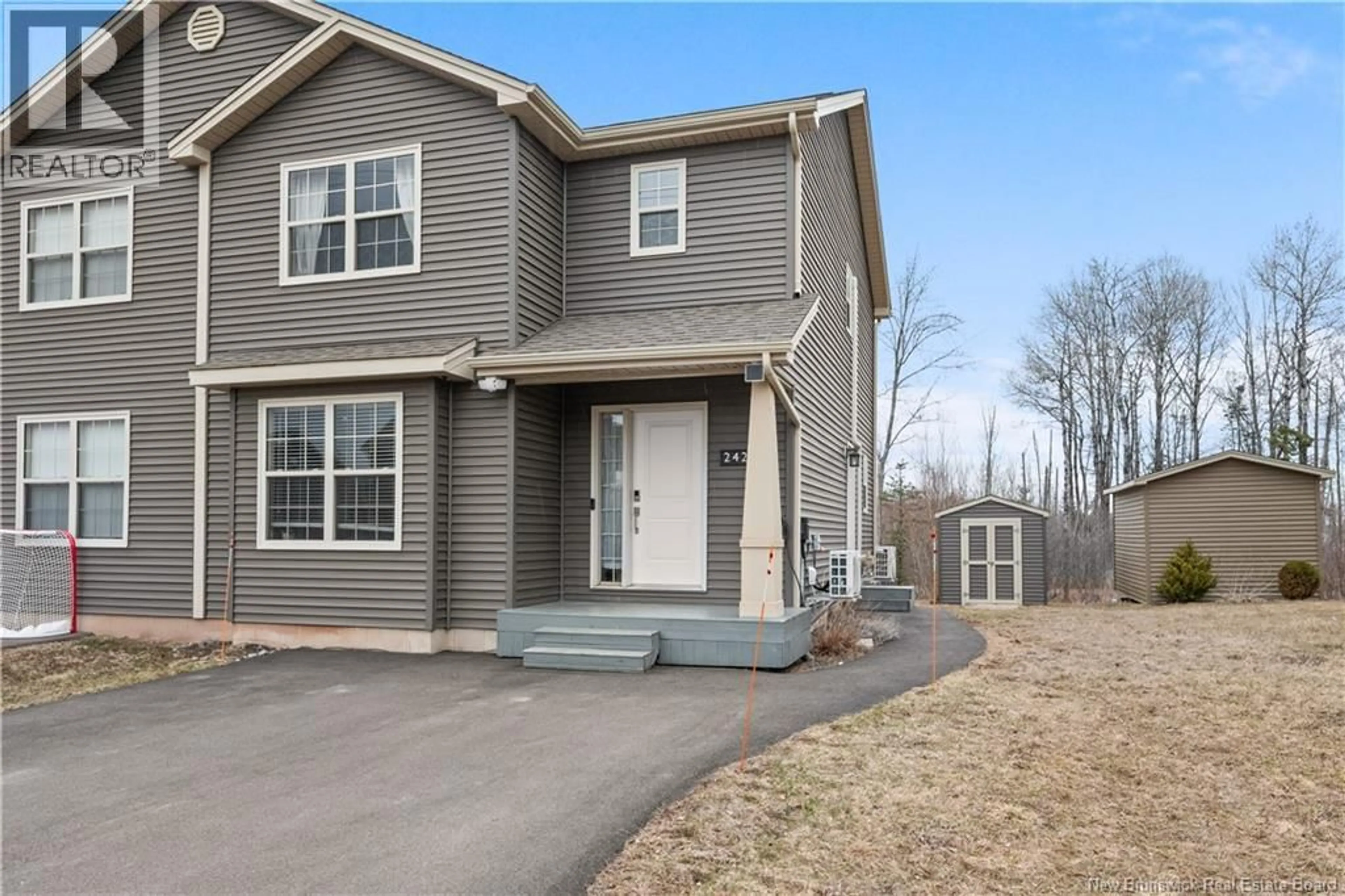 Home with vinyl exterior material, street for 242 ERINVALE DRIVE, Moncton New Brunswick E1A9S2