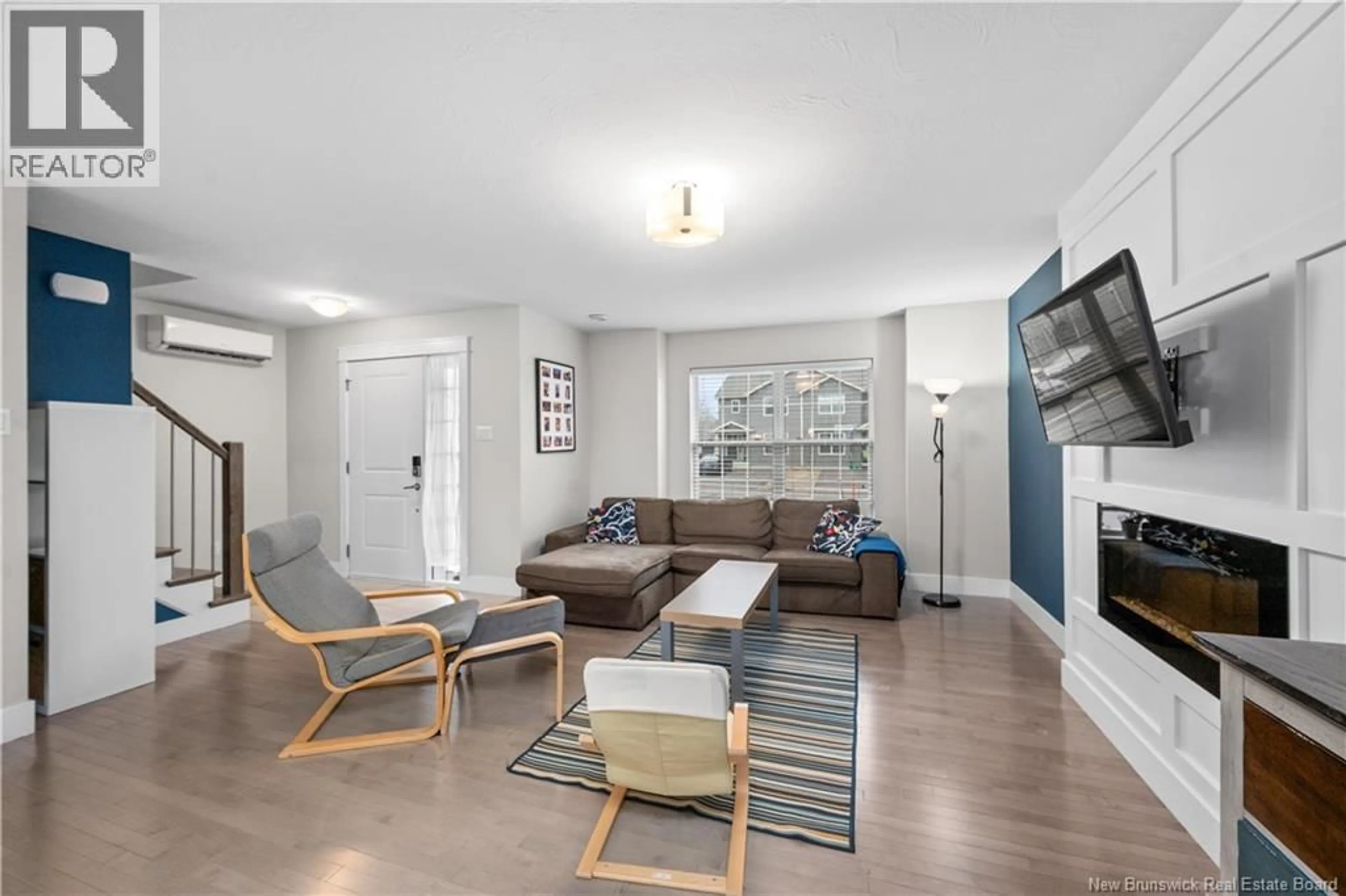 Living room with furniture, unknown for 242 ERINVALE DRIVE, Moncton New Brunswick E1A9S2