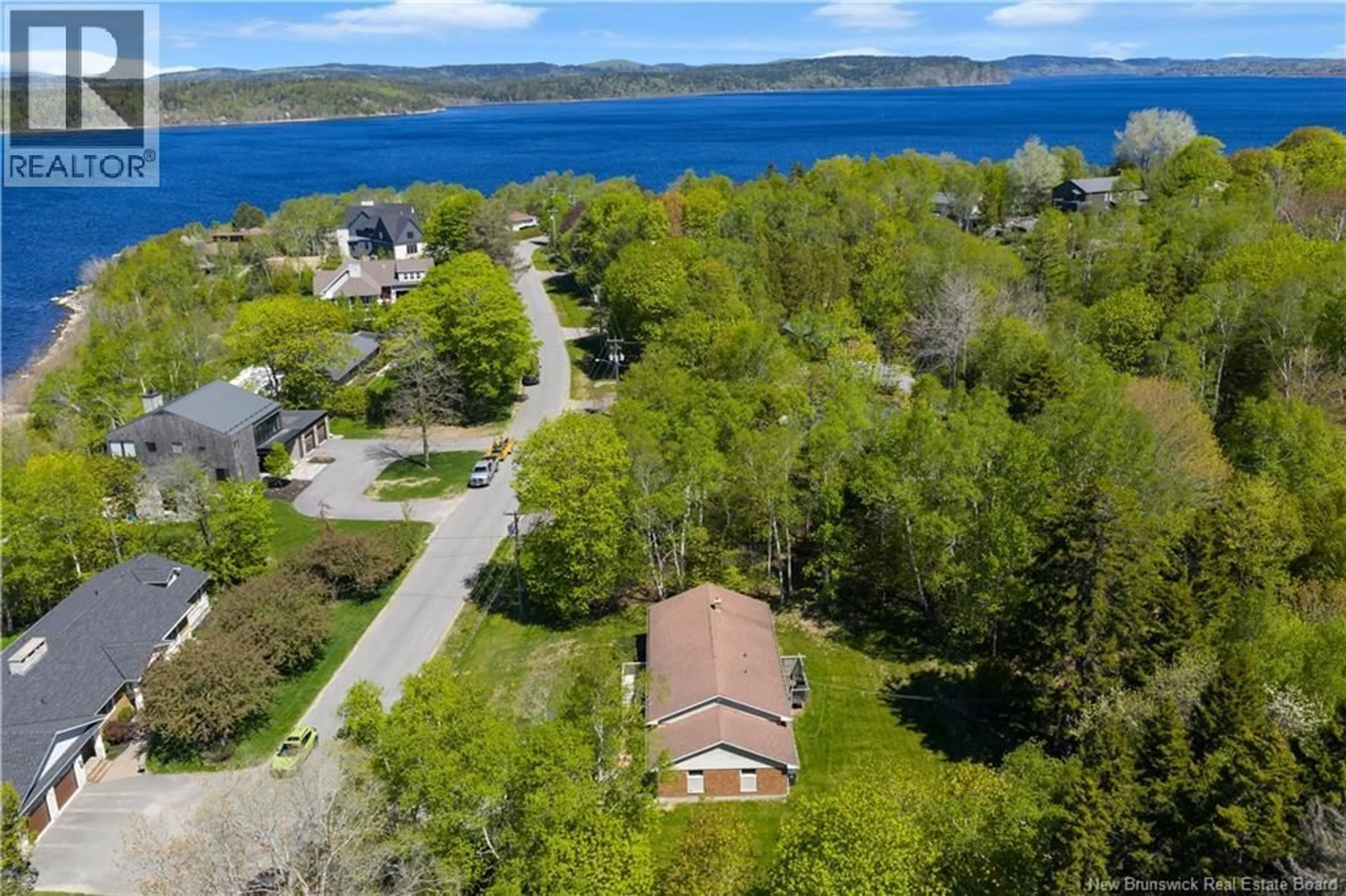 A pic from outside/outdoor area/front of a property/back of a property/a pic from drone, water/lake/river/ocean view for 68 ELIZABETH PARKWAY, Rothesay New Brunswick E2H1E9
