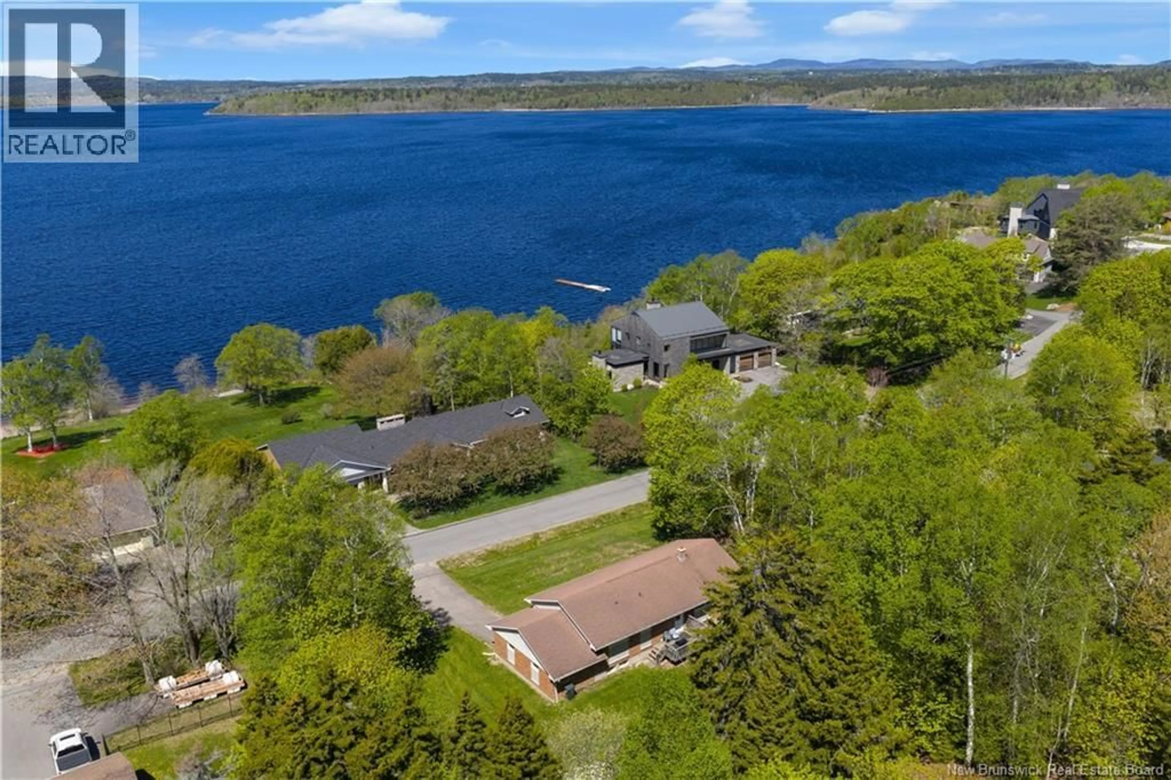 A pic from outside/outdoor area/front of a property/back of a property/a pic from drone, water/lake/river/ocean view for 68 ELIZABETH PARKWAY, Rothesay New Brunswick E2H1E9