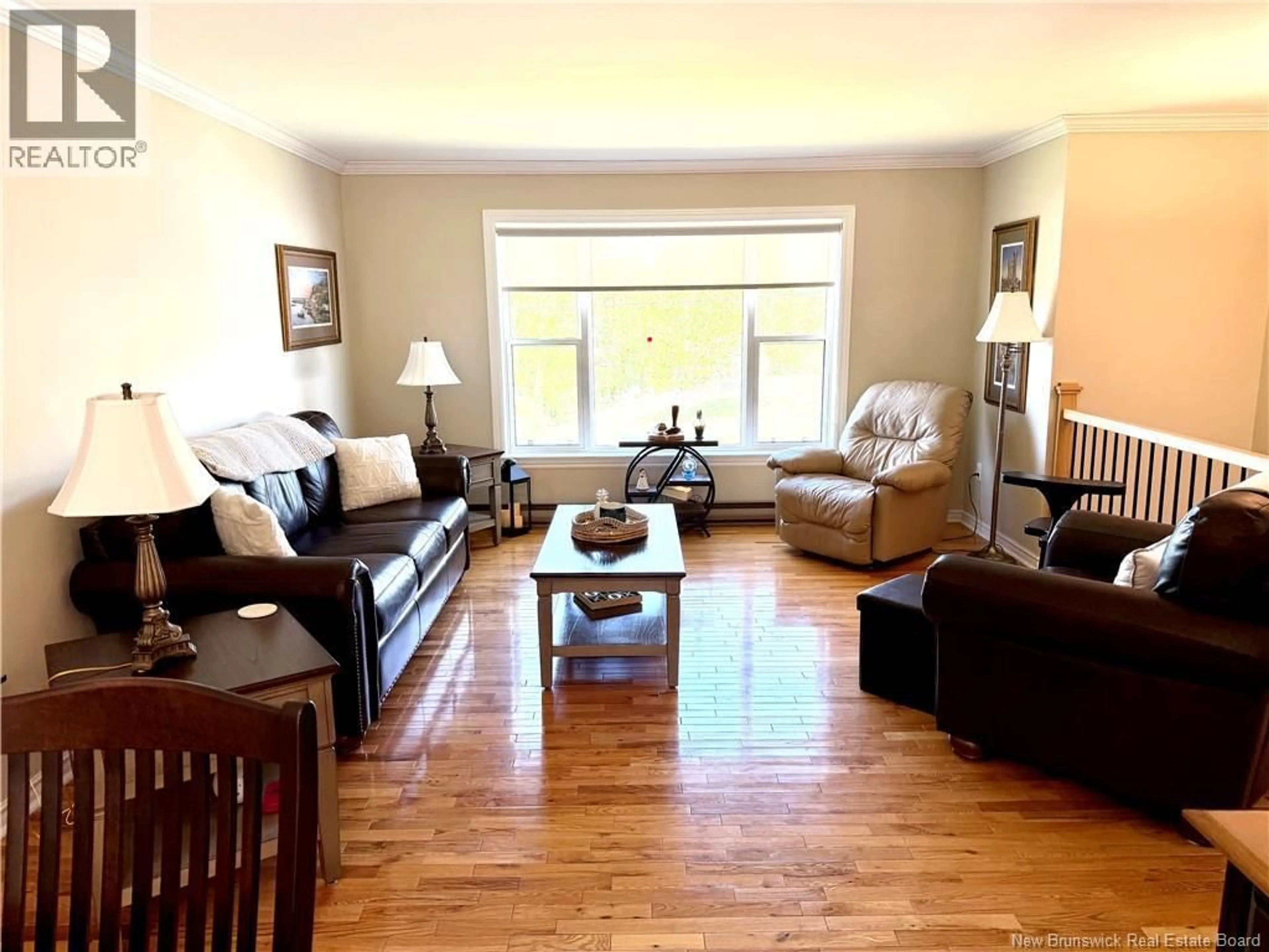 Living room with furniture, wood/laminate floor for 16 MAJESTIC DRIVE, Grand Bay-Westfield New Brunswick E5K2V8