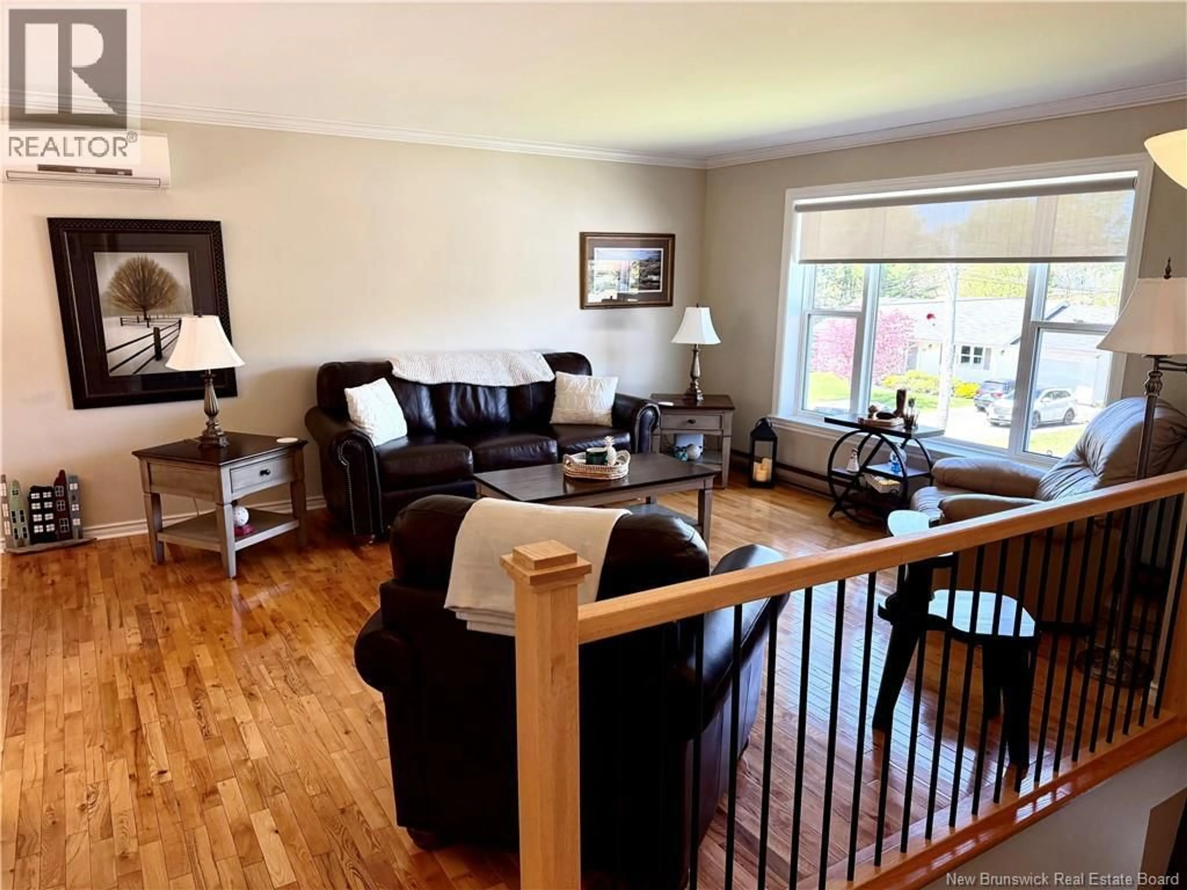 Living room with furniture, wood/laminate floor for 16 MAJESTIC DRIVE, Grand Bay-Westfield New Brunswick E5K2V8