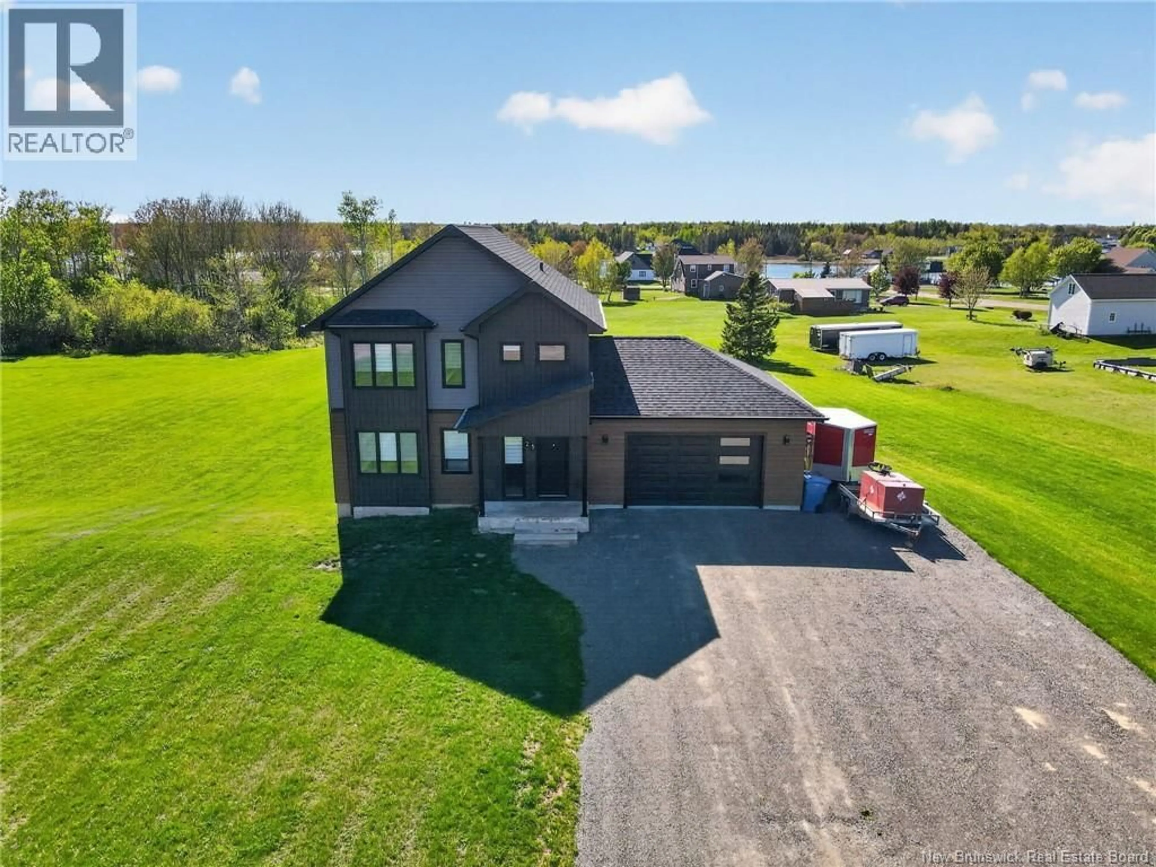 A pic from outside/outdoor area/front of a property/back of a property/a pic from drone, building for 25 GEORGES RUE, Grand-Barachois New Brunswick E4P7N1