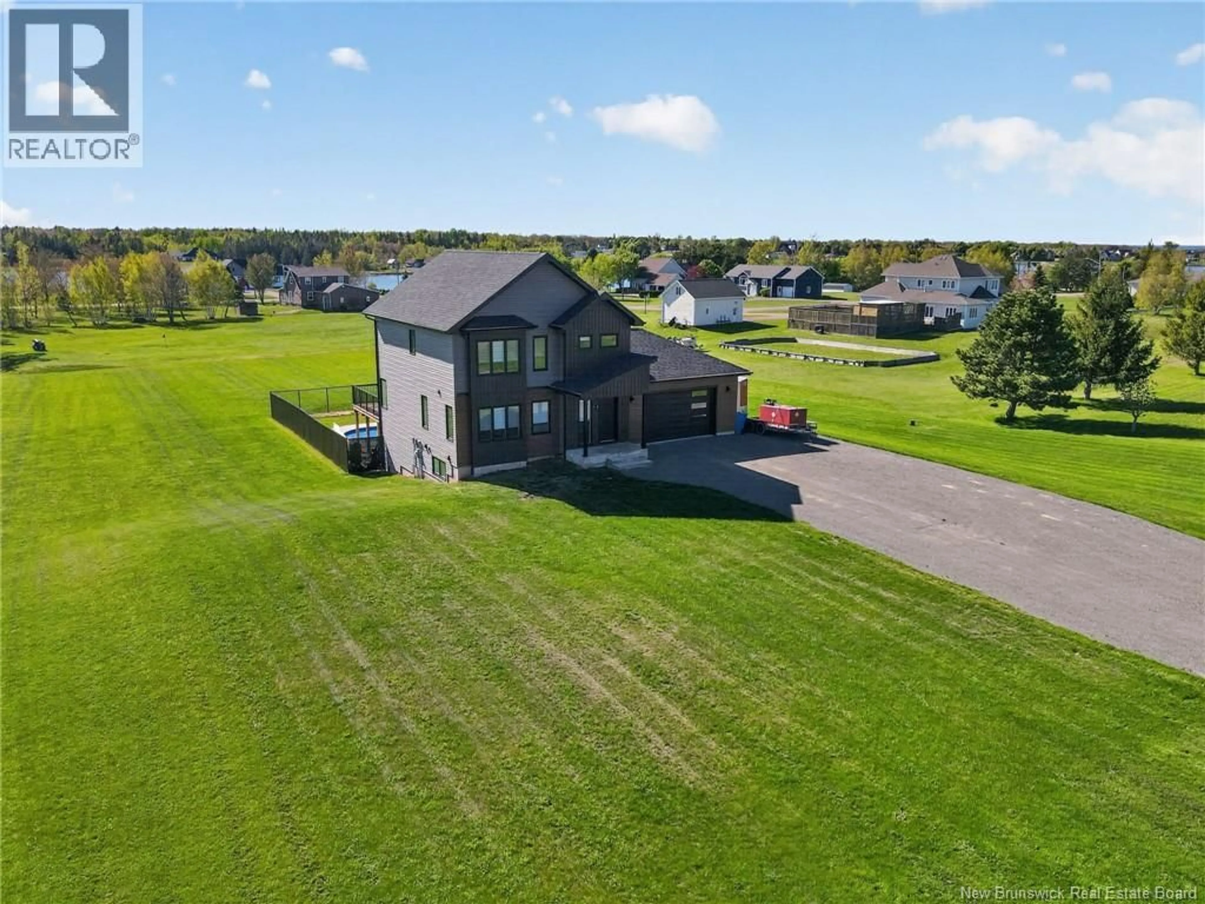 A pic from outside/outdoor area/front of a property/back of a property/a pic from drone, water/lake/river/ocean view for 25 GEORGES RUE, Grand-Barachois New Brunswick E4P7N1