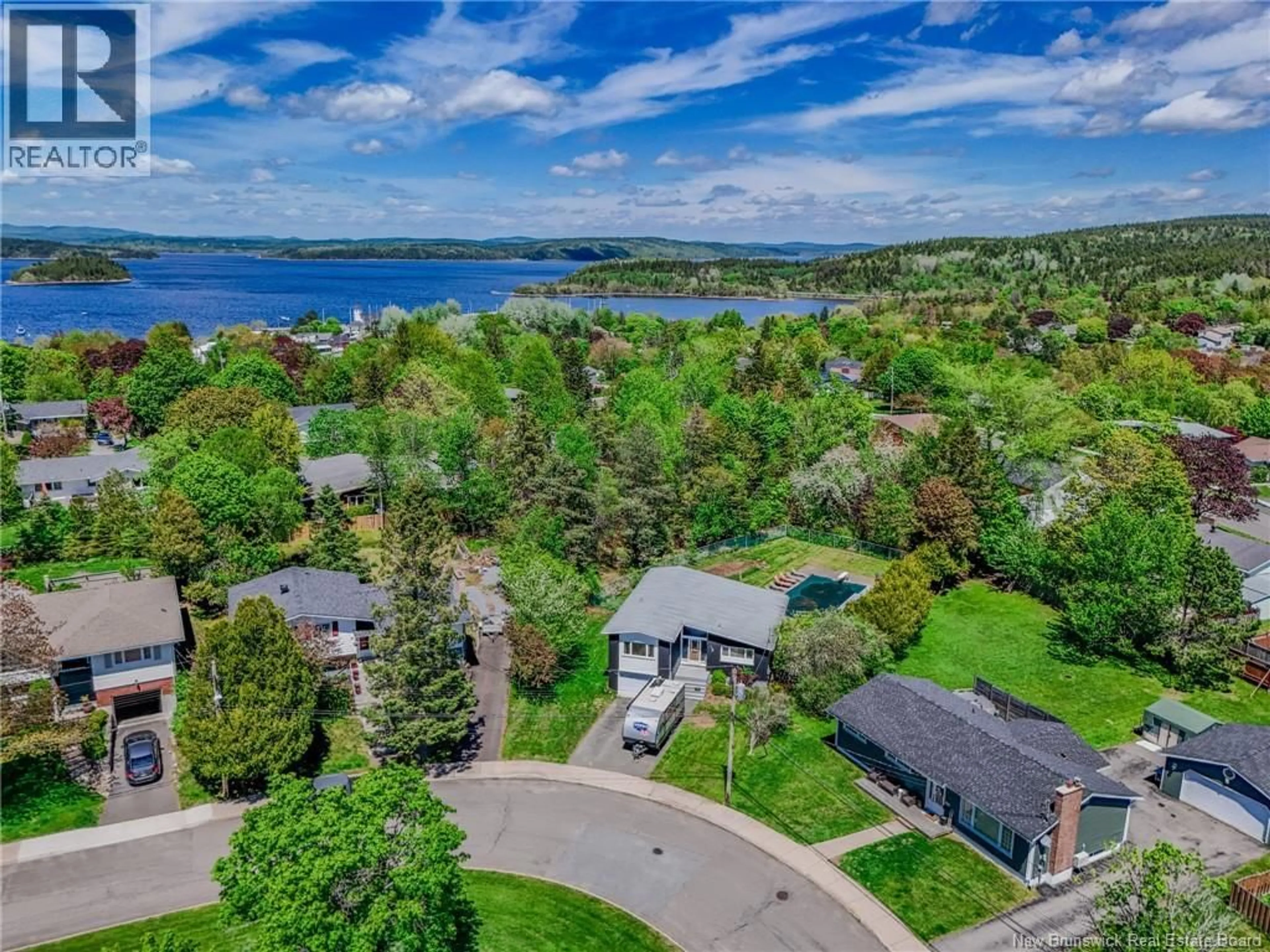 A pic from outside/outdoor area/front of a property/back of a property/a pic from drone, water/lake/river/ocean view for 12 GRANT CRESCENT, Saint John New Brunswick E2K2A9