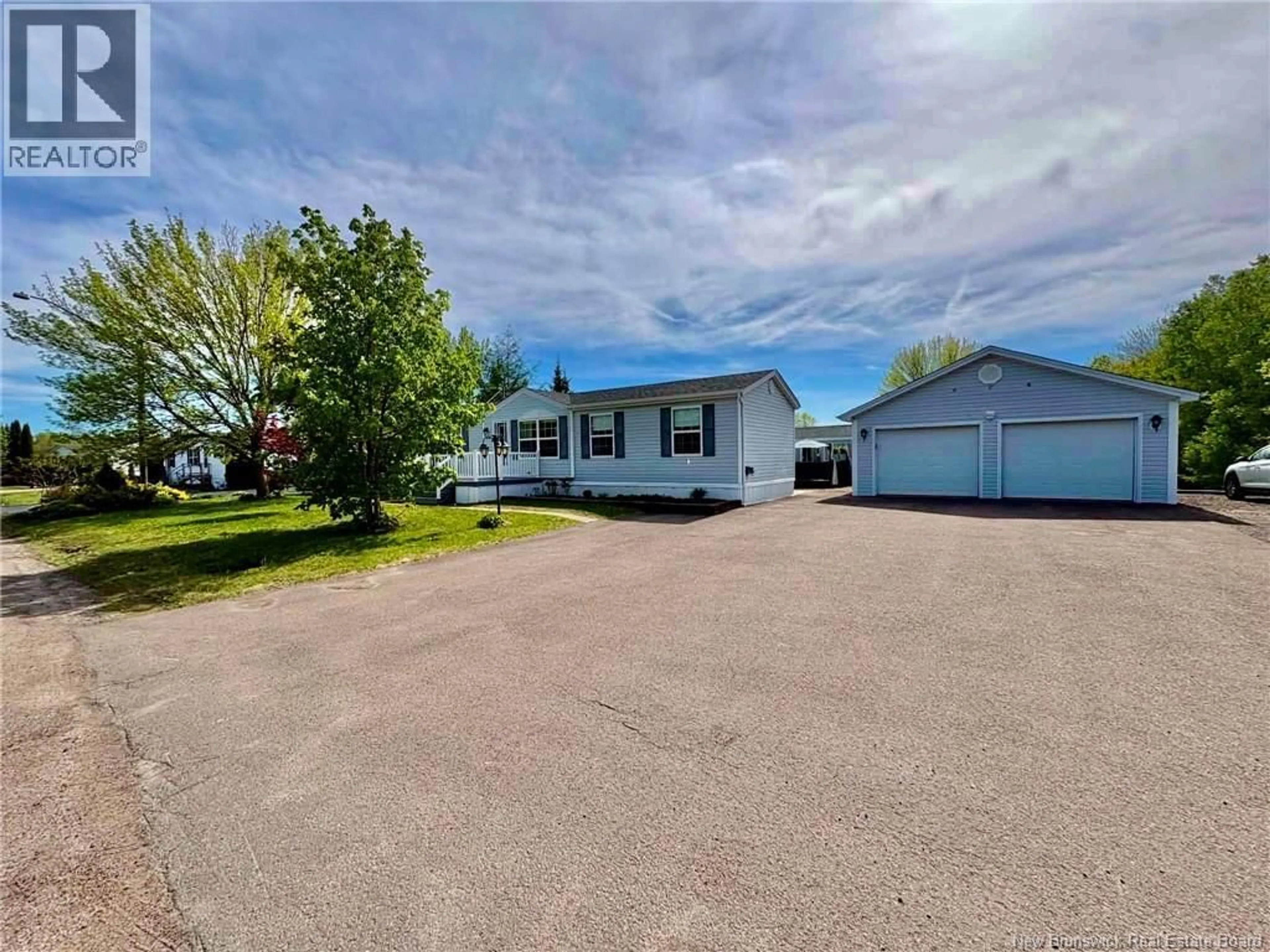 A pic from outside/outdoor area/front of a property/back of a property/a pic from drone, water/lake/river/ocean view for 16 ANEMONE STREET, Moncton New Brunswick E1H2R7