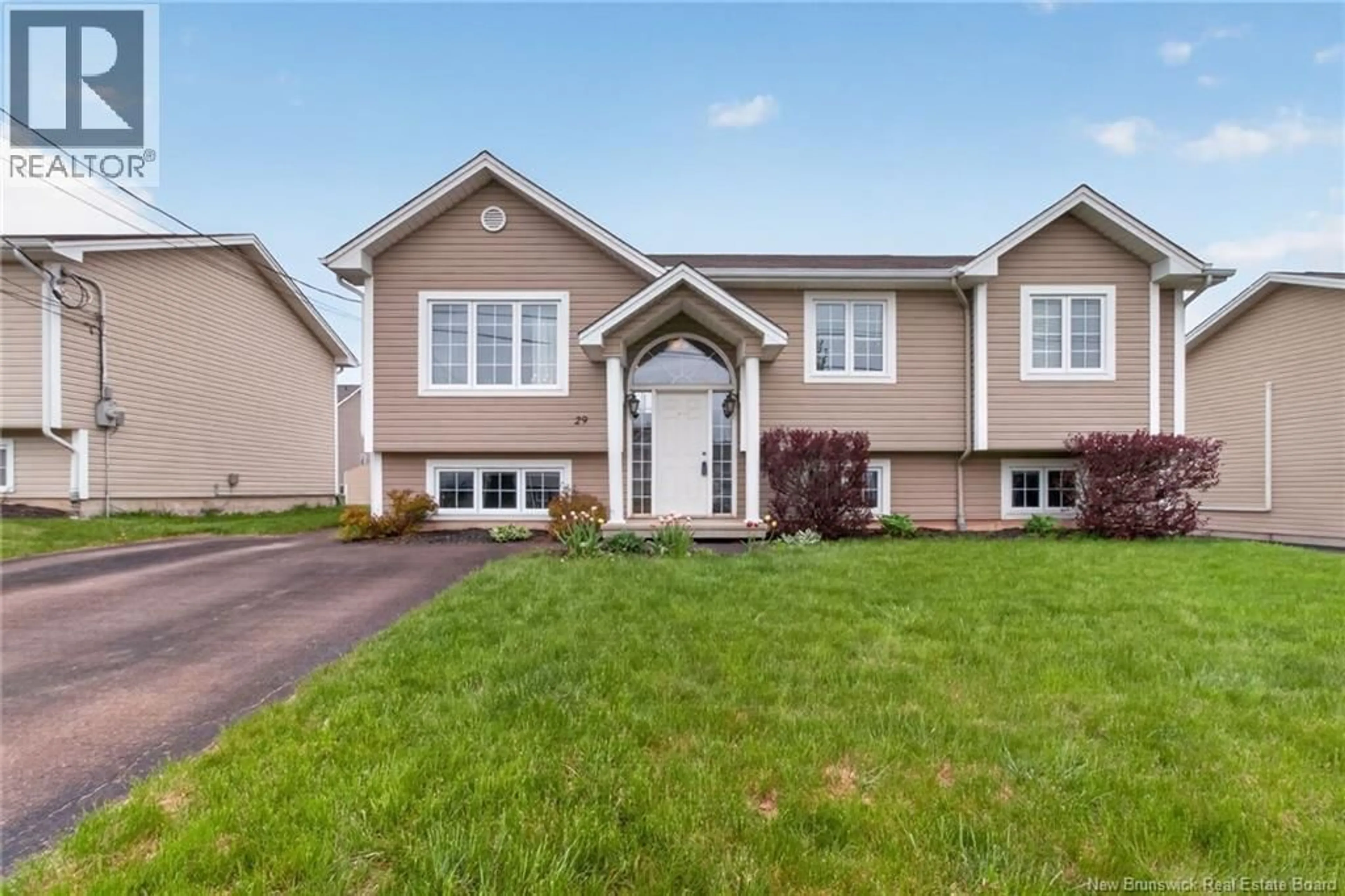 Home with vinyl exterior material, street for 29 FALCON DRIVE, Moncton New Brunswick E1G0H8