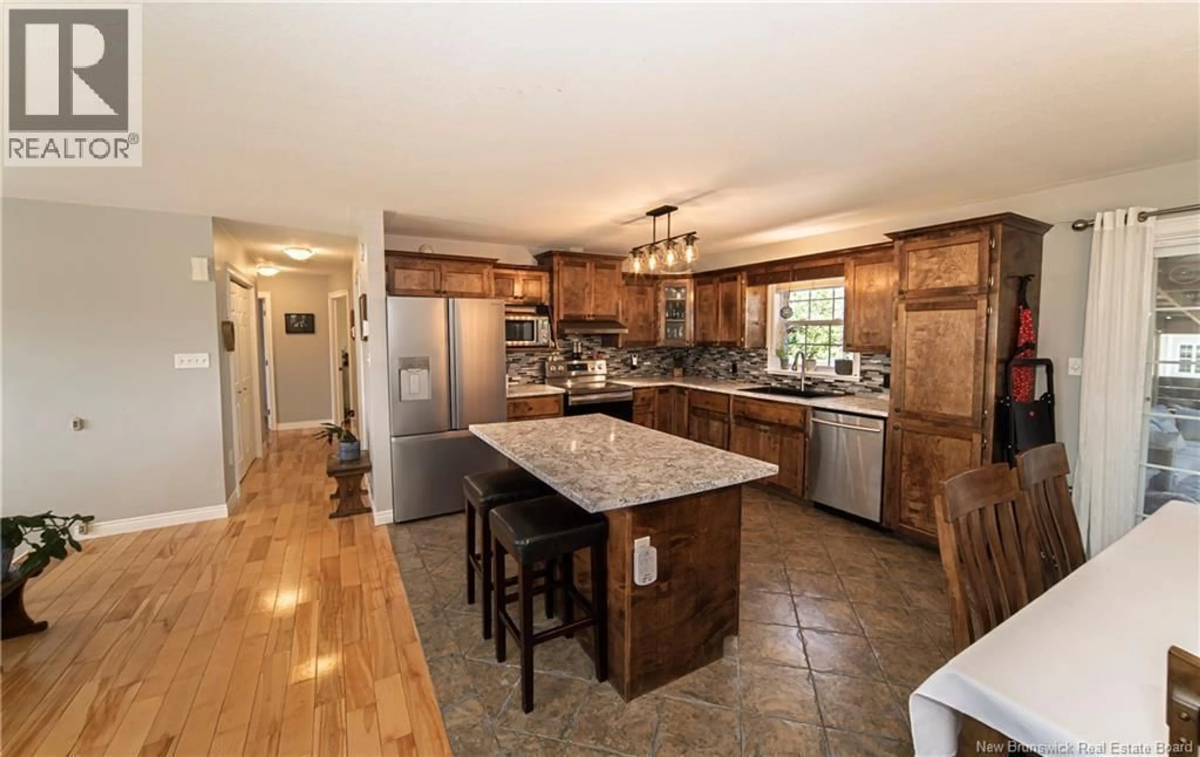 Open concept kitchen, ceramic/tile floor for 40 DAWSON DRIVE, Oromocto New Brunswick E2V0B8