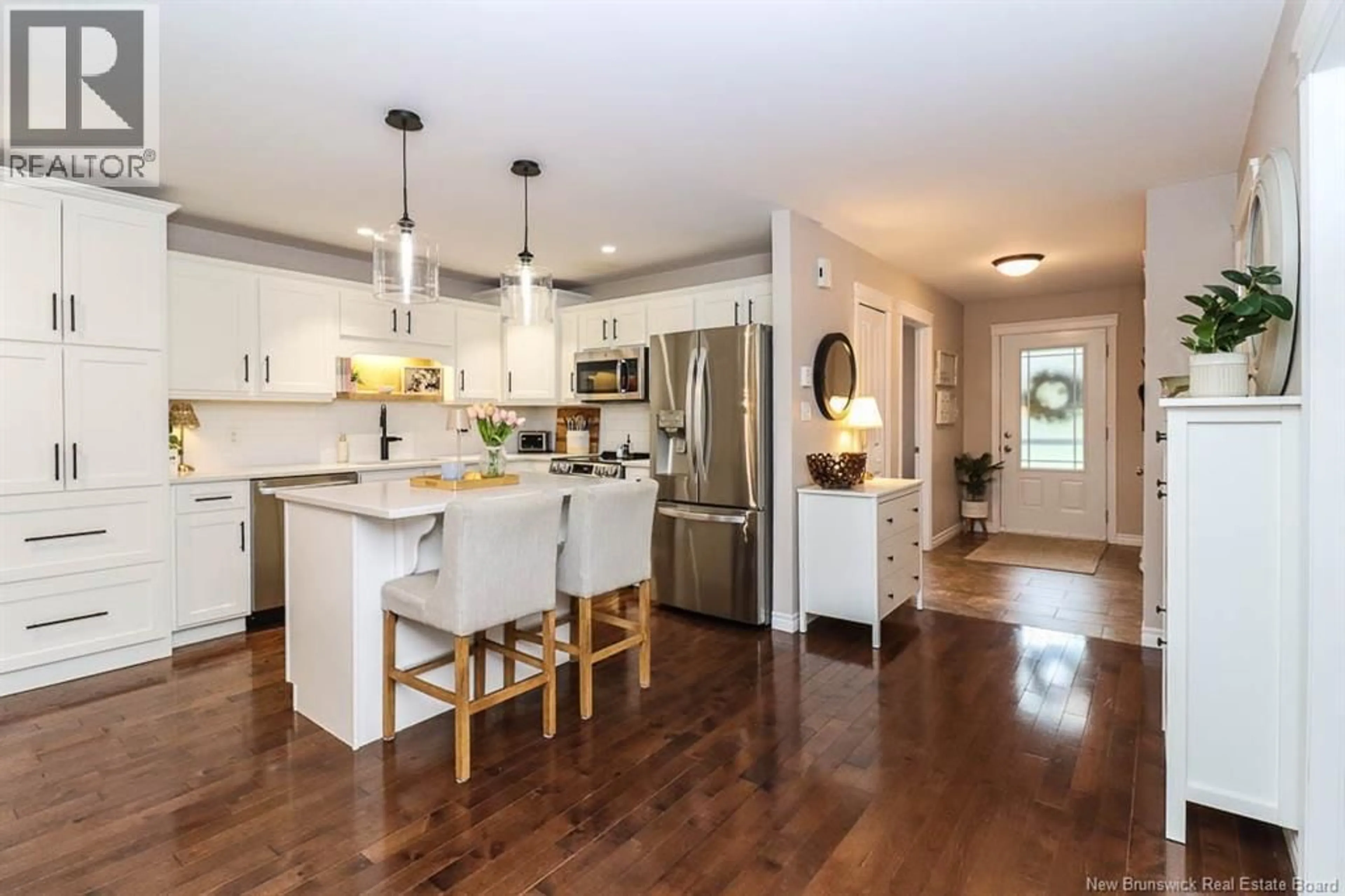 Open concept kitchen, wood/laminate floor for 30 KAITLYN STREET, Rothesay New Brunswick E2E0M6
