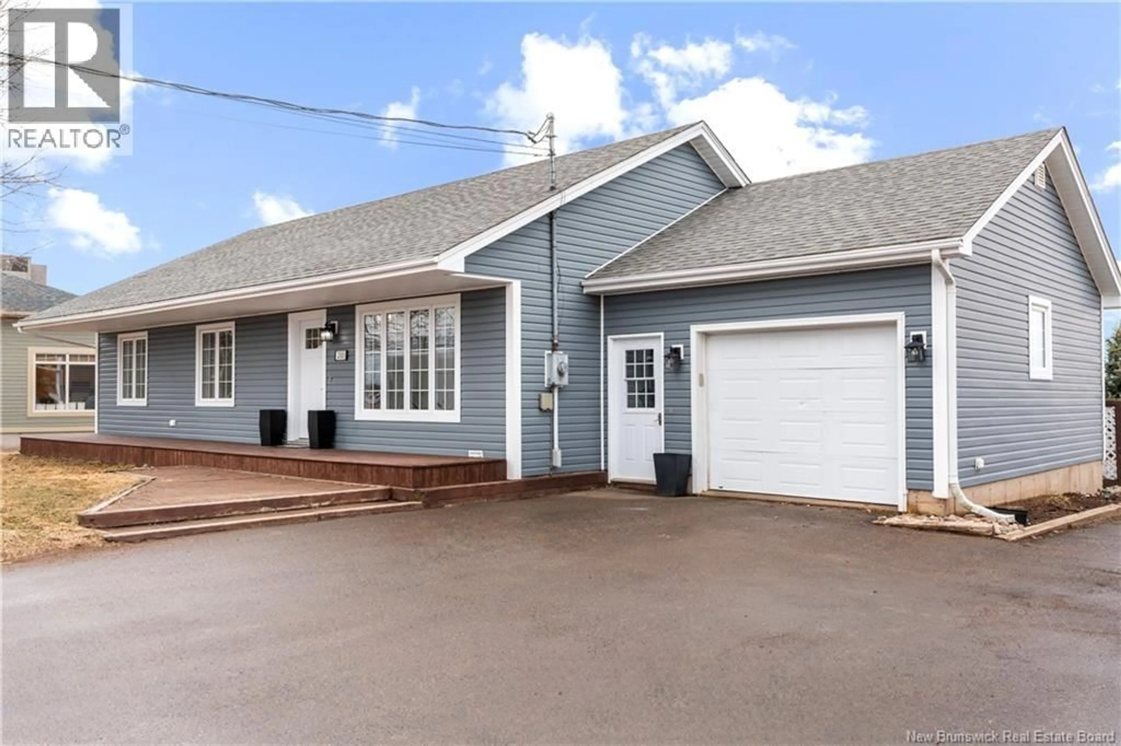 Home with vinyl exterior material, street for 200 IRVING BOULEVARD, Bouctouche New Brunswick E4S3L7