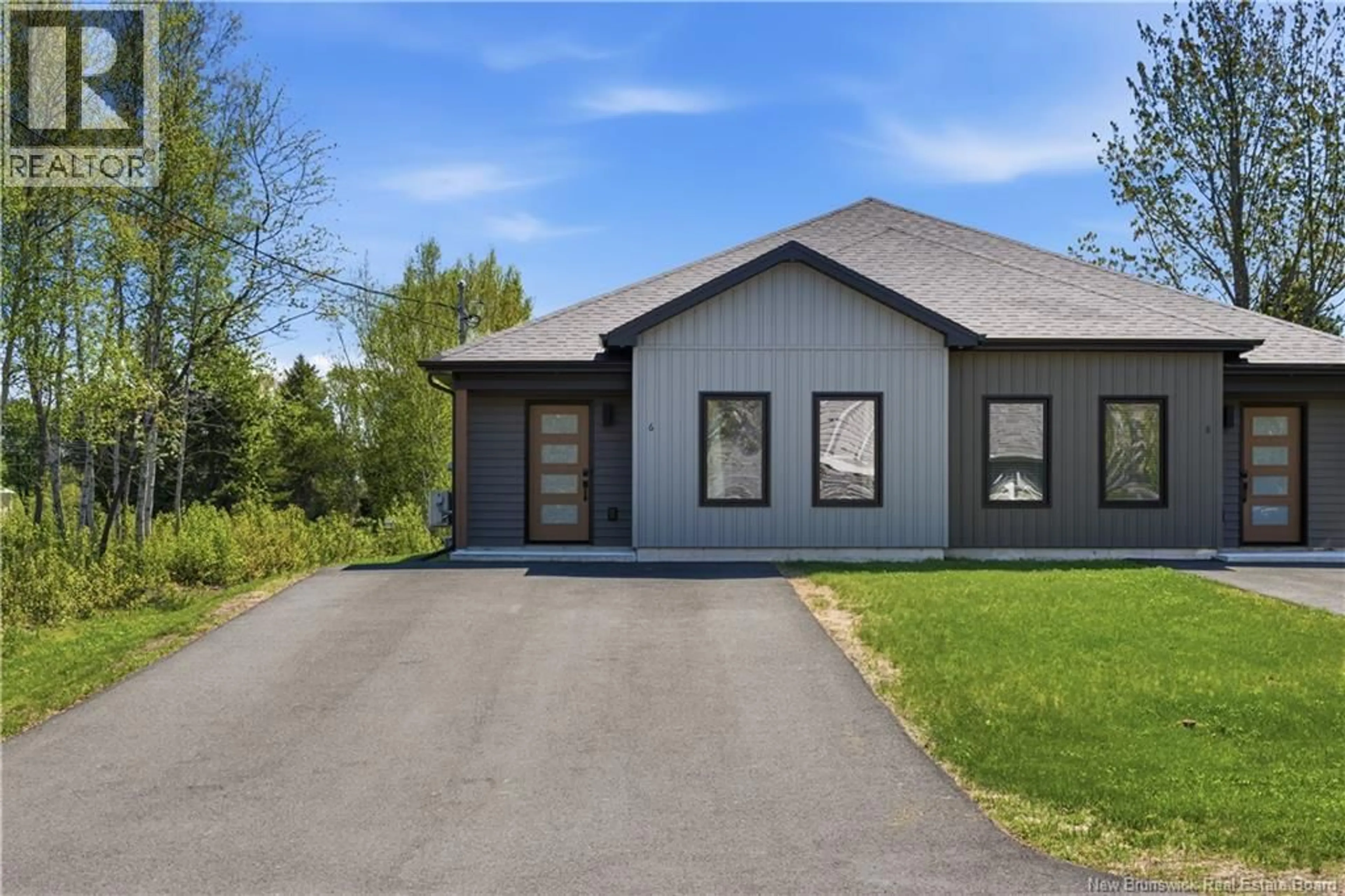 Home with vinyl exterior material, street for 6 IRENE AVENUE, Bouctouche New Brunswick E4S0G8