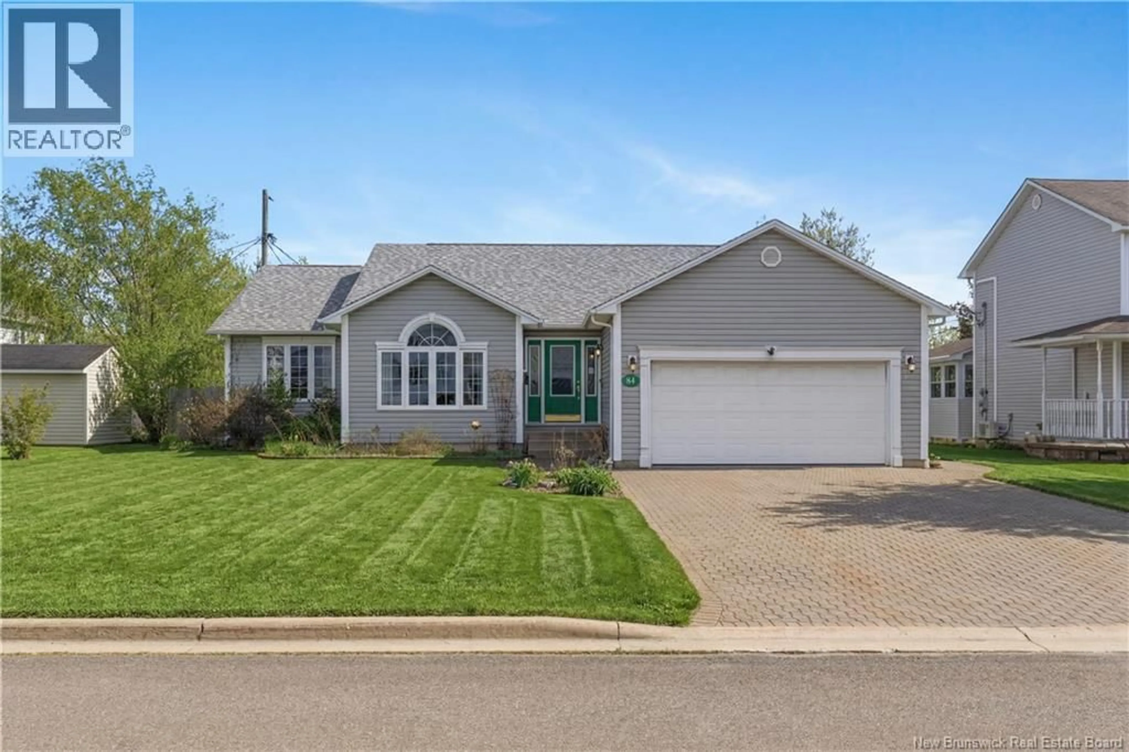 Home with vinyl exterior material, street for 84 HILLARY CRESCENT, Moncton New Brunswick E1C0A8