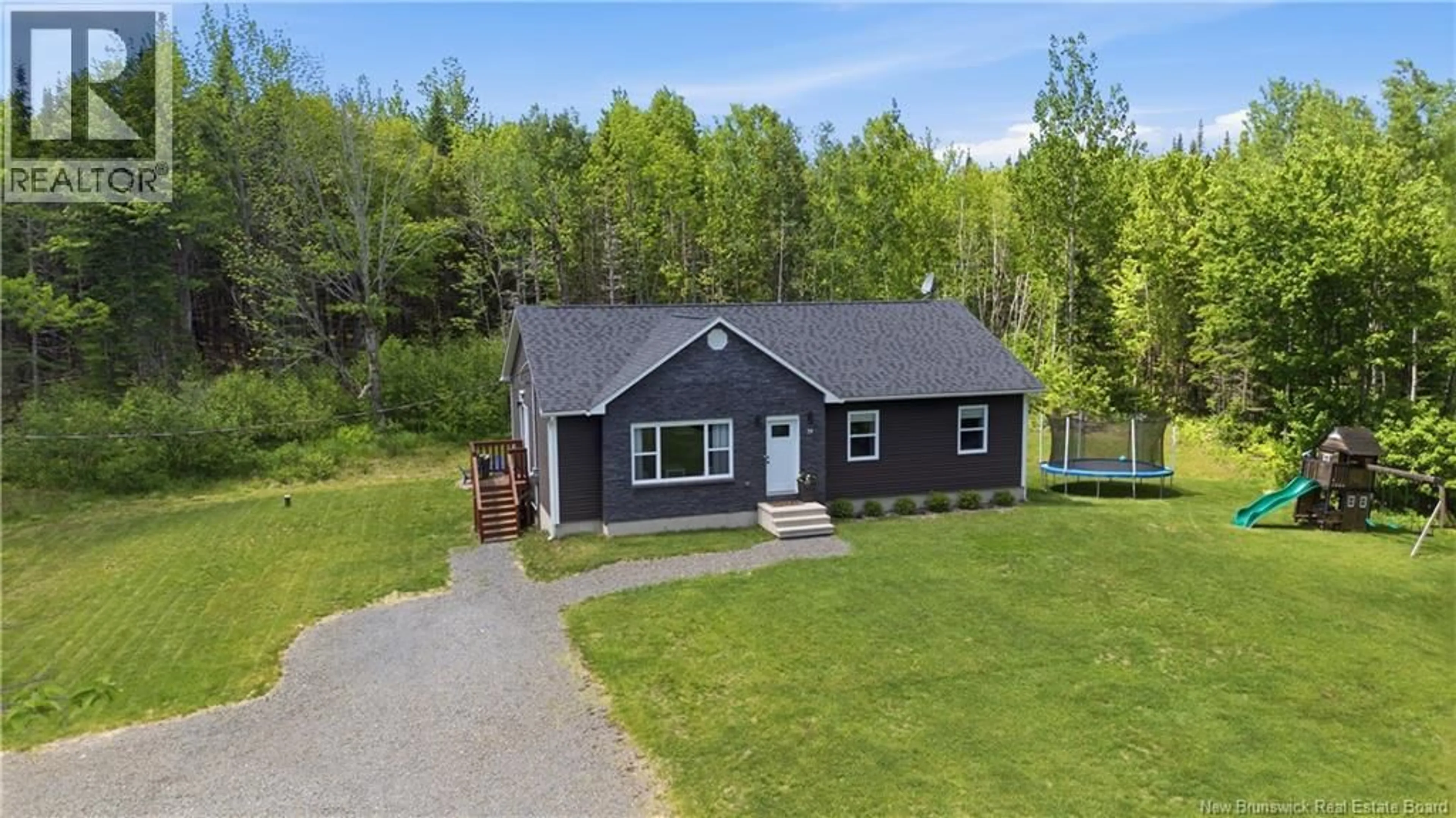 A pic from outside/outdoor area/front of a property/back of a property/a pic from drone, unknown for 39 MALBEC LANE, Noonan New Brunswick E3A7N6