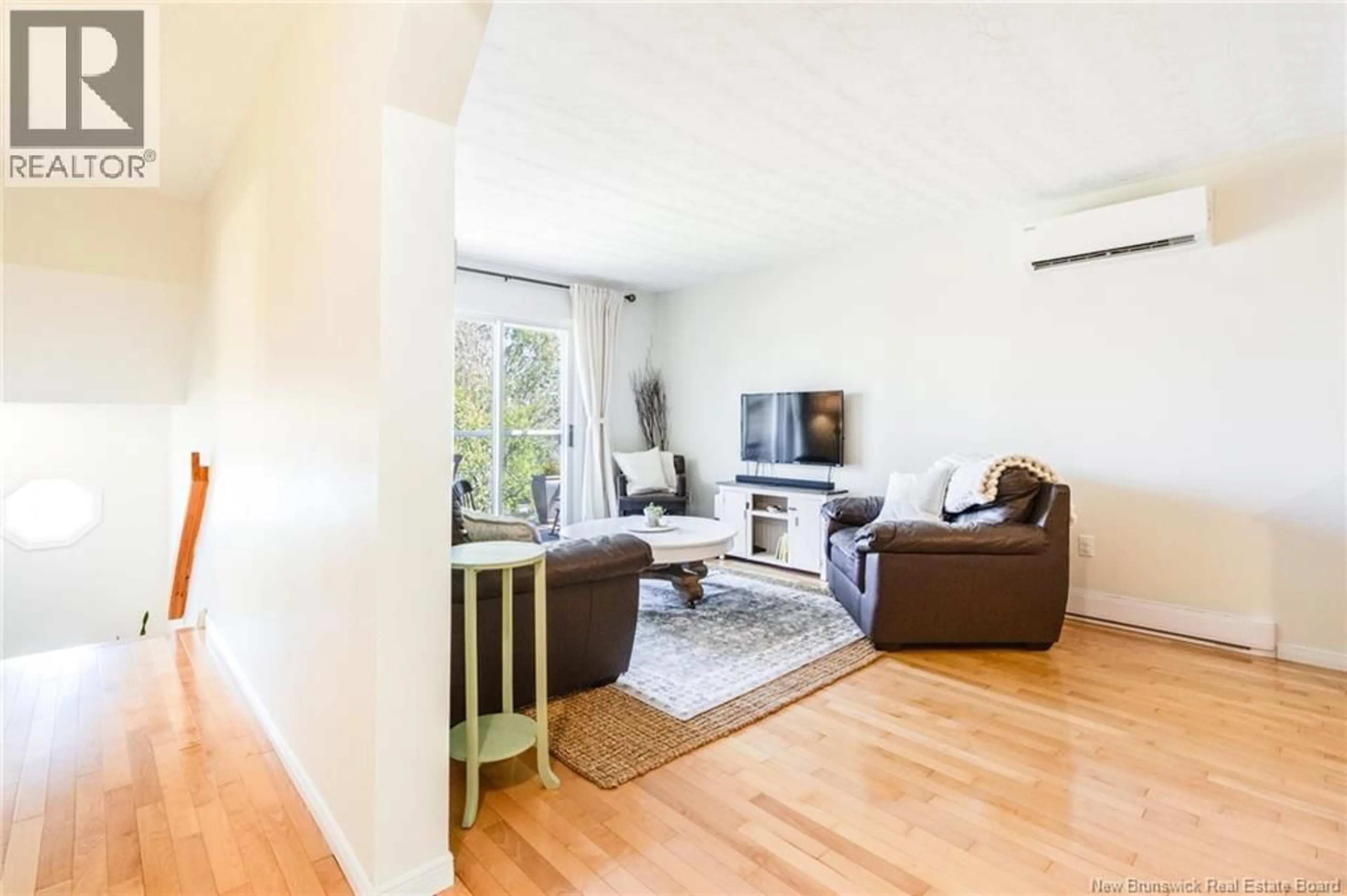 Living room with furniture, wood/laminate floor for 56 ANGELVIEW COURT, Fredericton New Brunswick E3B7A8