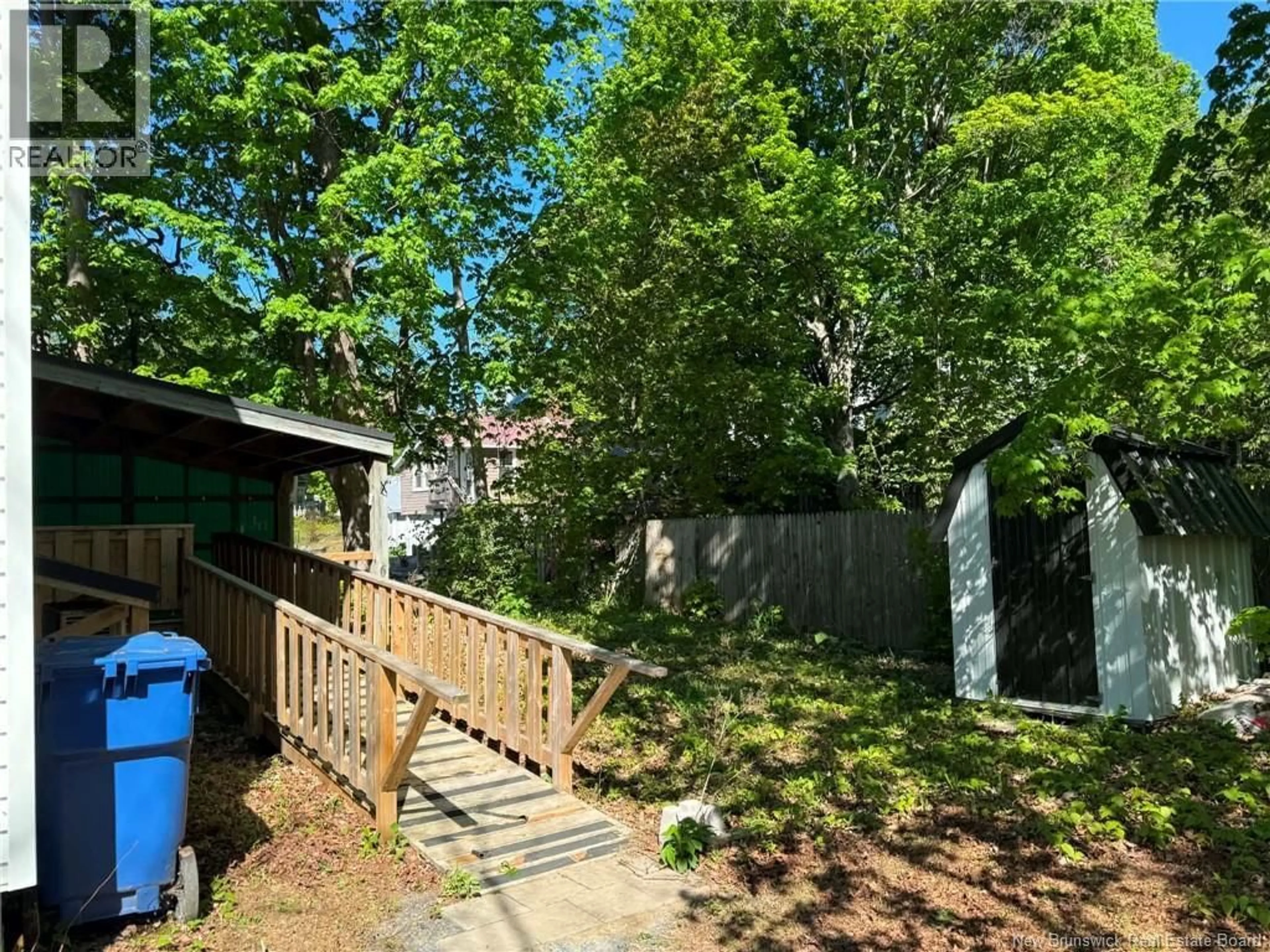 A pic from outside/outdoor area/front of a property/back of a property/a pic from drone, forest/trees view for 106 COLLEGE STREET, Woodstock New Brunswick E7M1K6