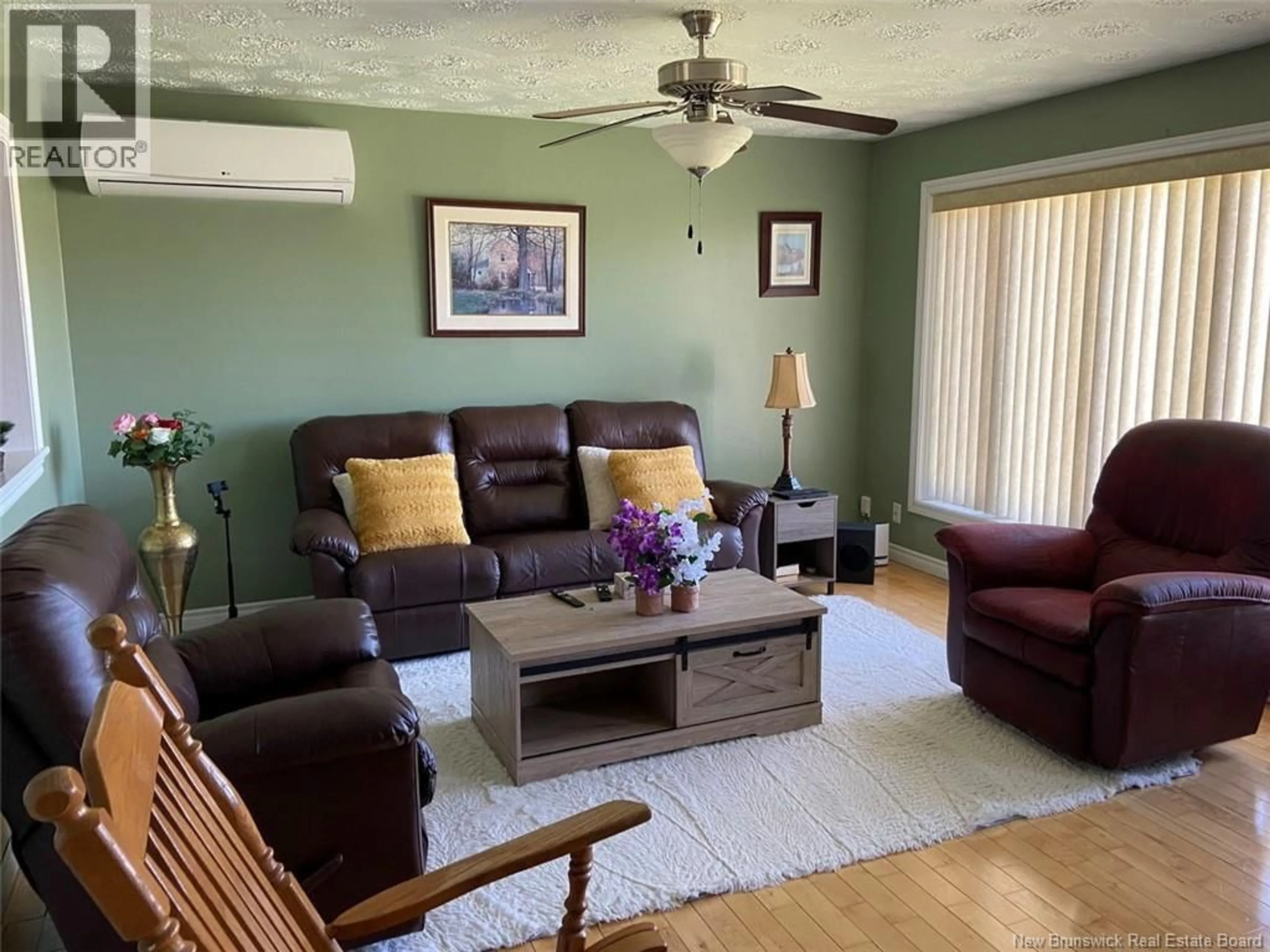 Living room with furniture, wood/laminate floor for 20 SIROIS ROAD, Sainte-Anne-De-Madawaska New Brunswick E7E1H9