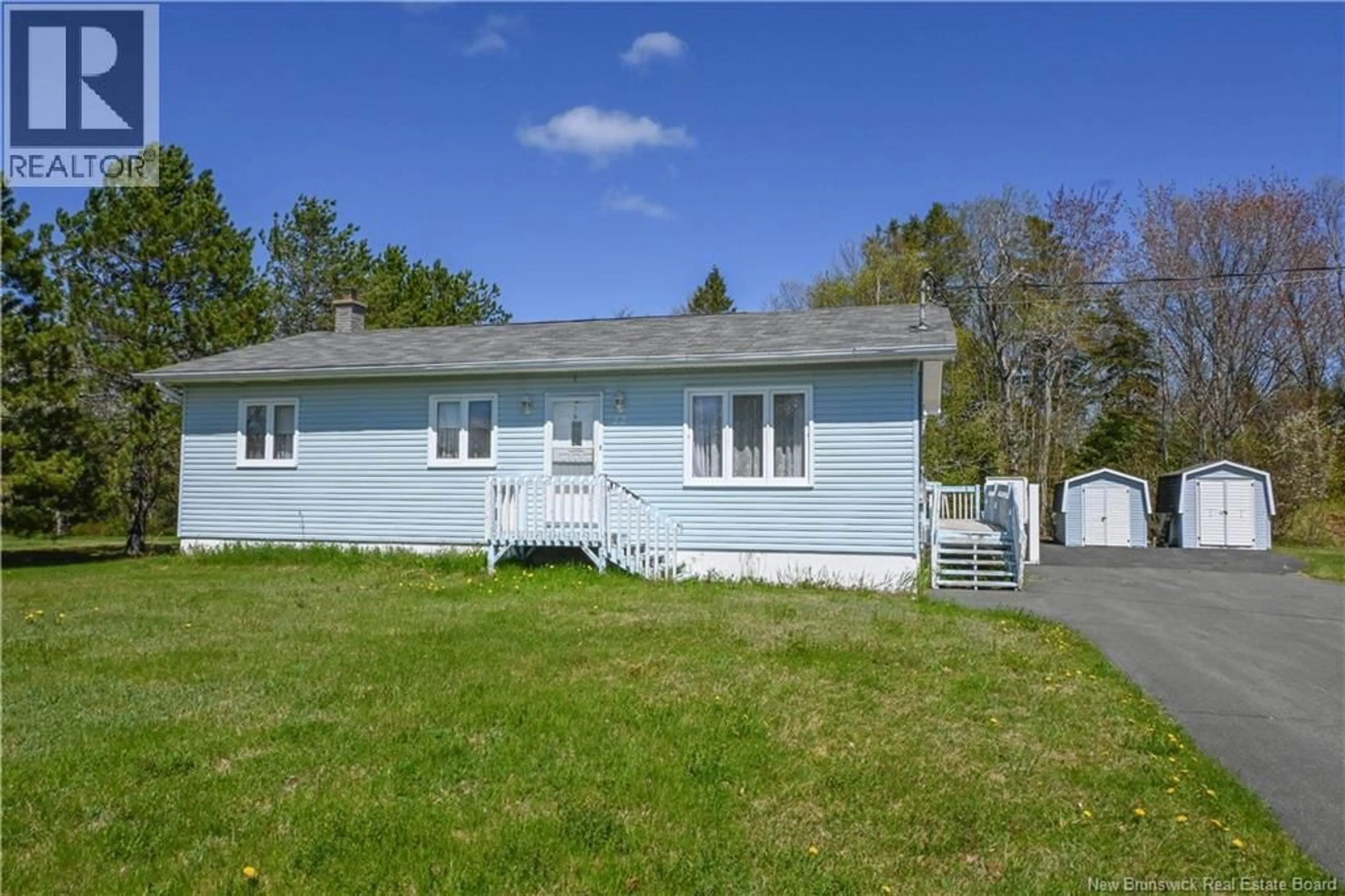 Home with vinyl exterior material, street for 22 JEANNE D'ARC STREET, Rivière-À-La-Truite New Brunswick E1X2N4