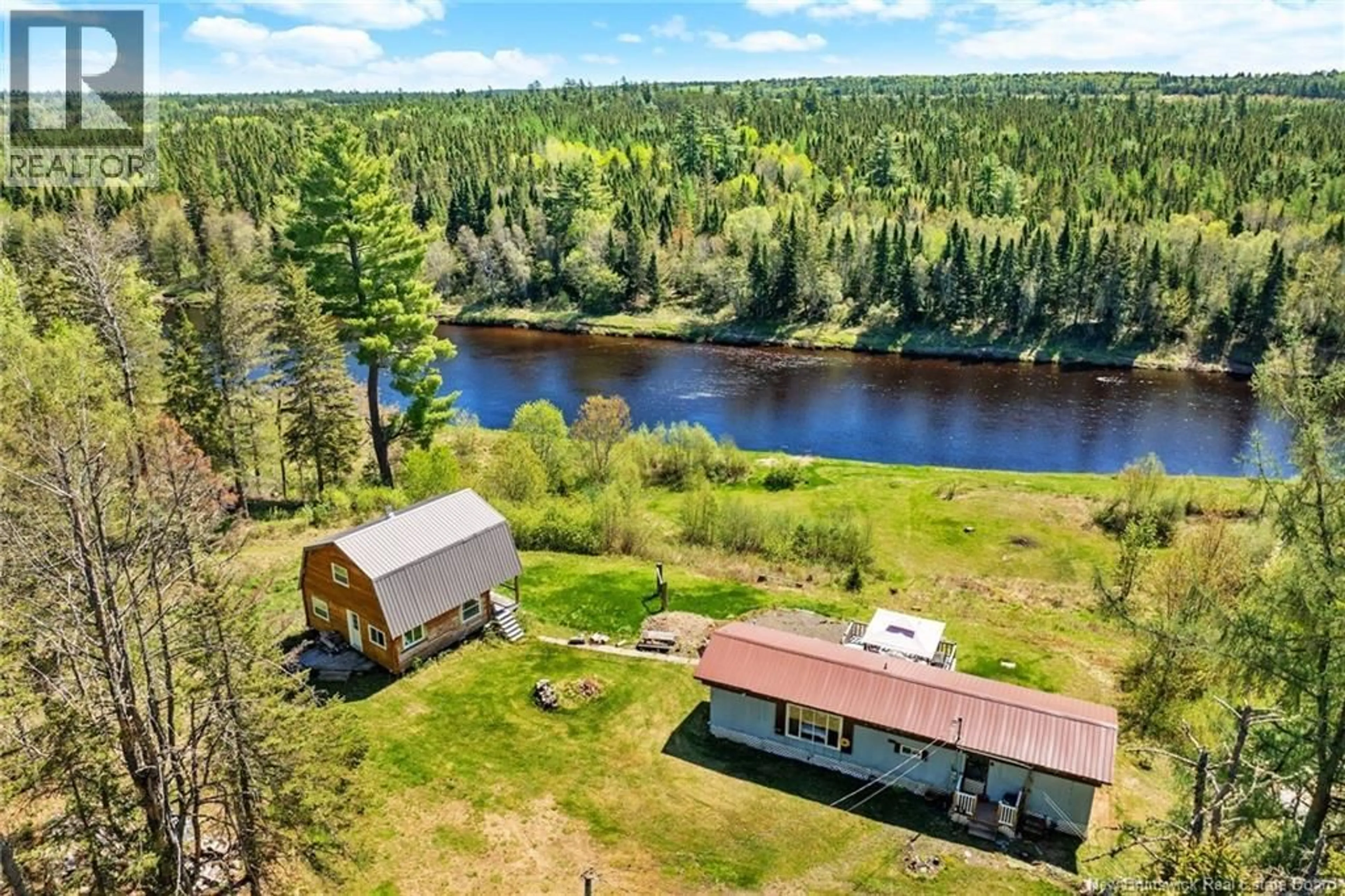A pic from outside/outdoor area/front of a property/back of a property/a pic from drone, water/lake/river/ocean view for 1500 RTE 116, Salmon River Rd New Brunswick E4A1H4