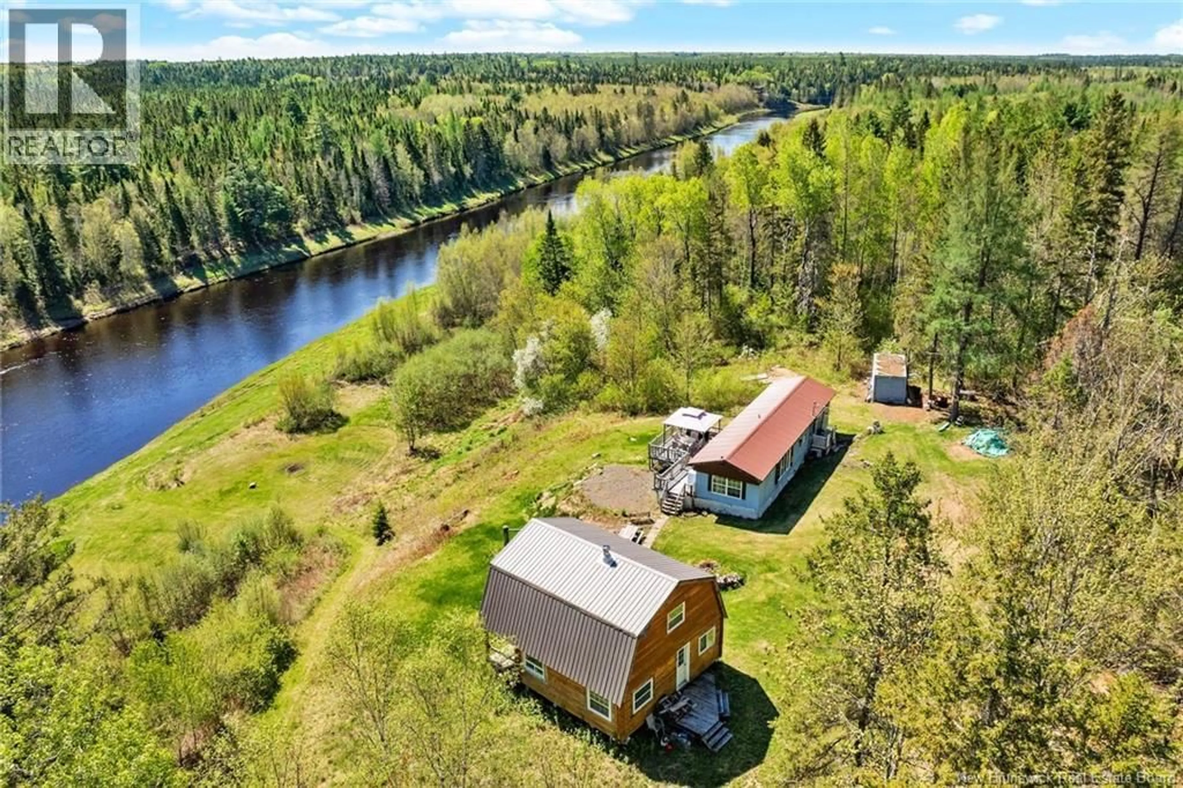A pic from outside/outdoor area/front of a property/back of a property/a pic from drone, water/lake/river/ocean view for 1500 RTE 116, Salmon River Rd New Brunswick E4A1H4