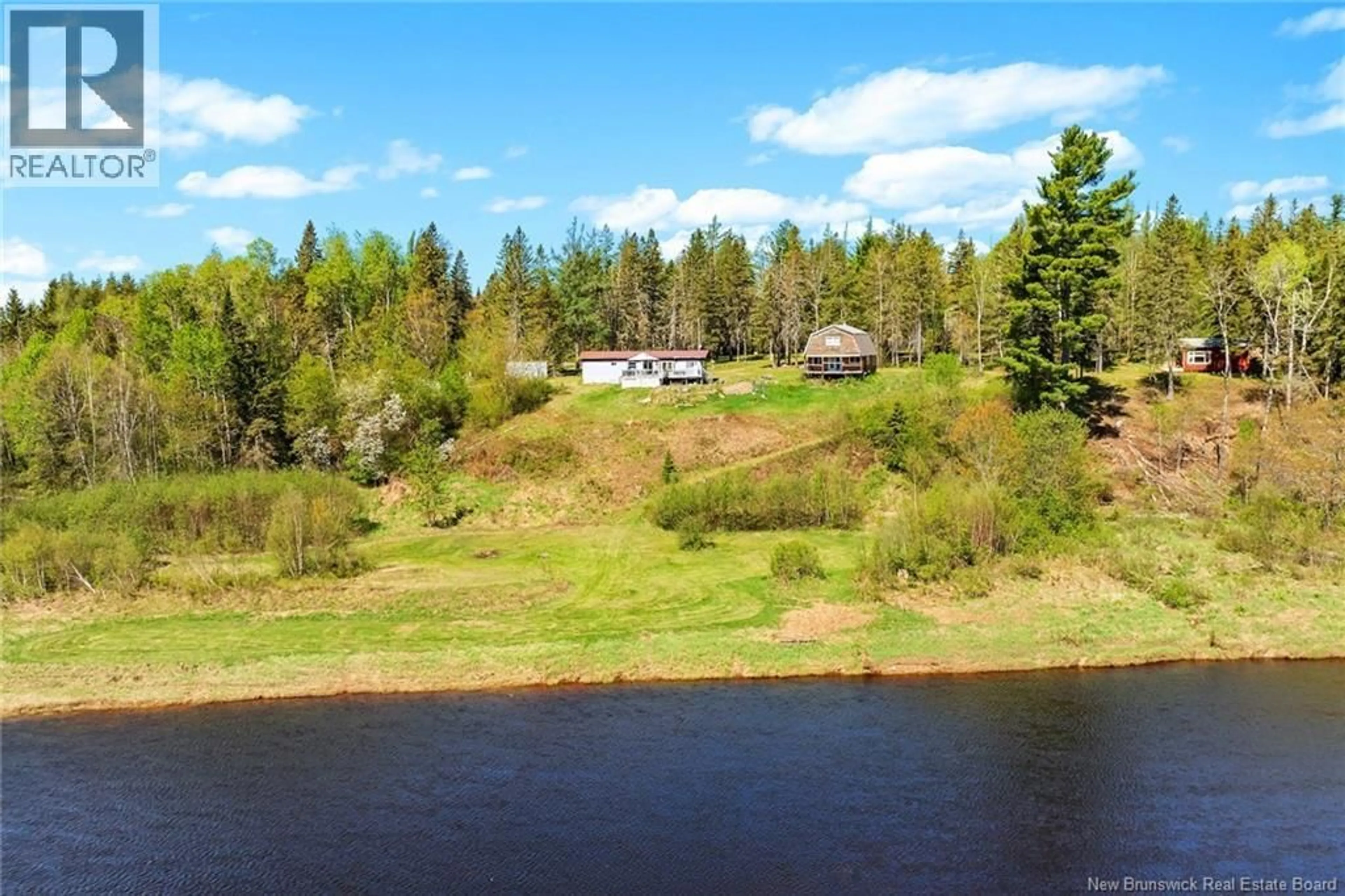 A pic from outside/outdoor area/front of a property/back of a property/a pic from drone, water/lake/river/ocean view for 1500 RTE 116, Salmon River Rd New Brunswick E4A1H4